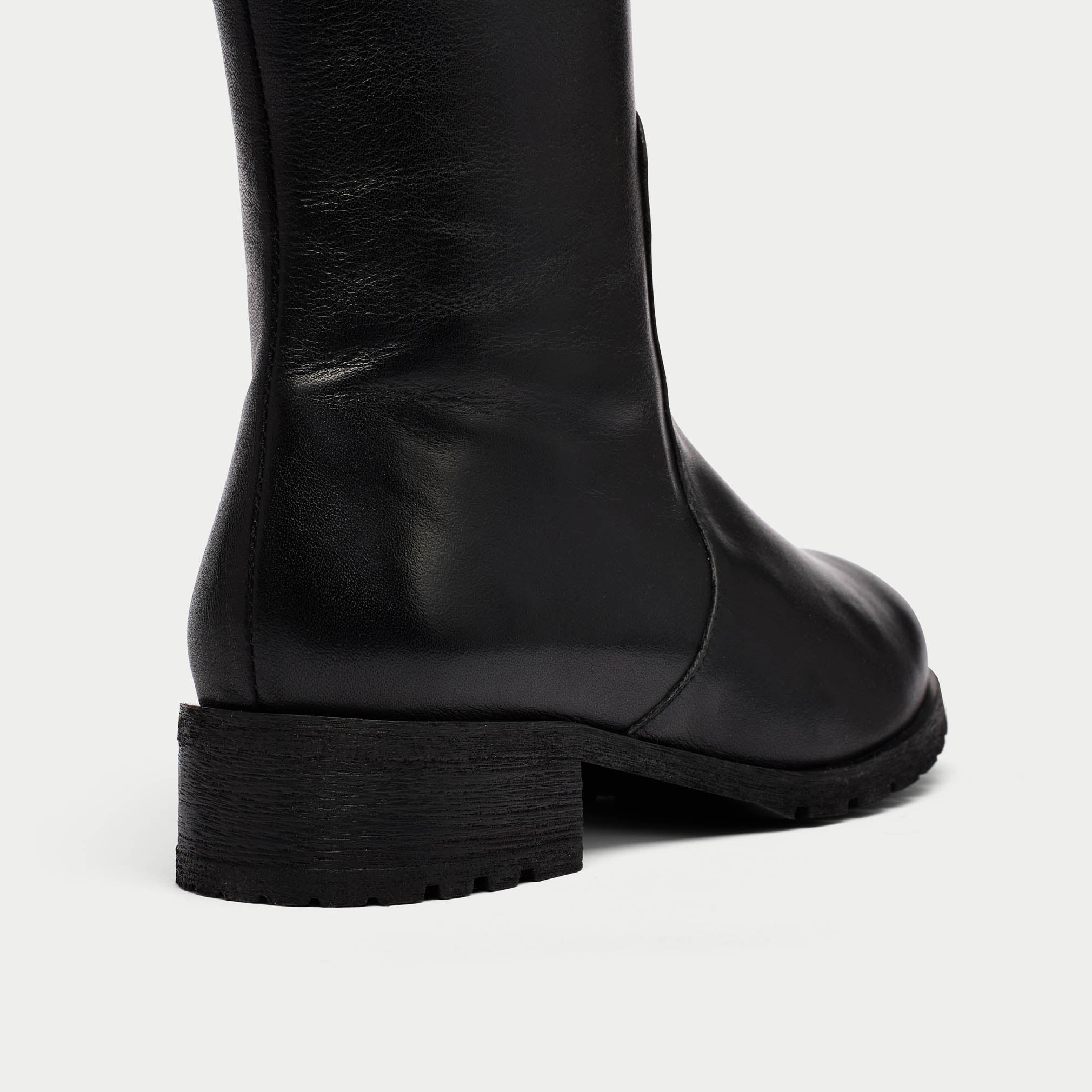 Bella black boot heel close up