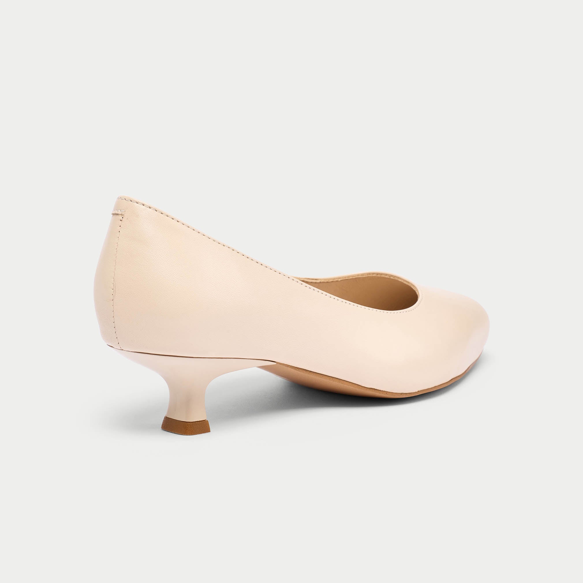 Claudia light beige heels heel close up