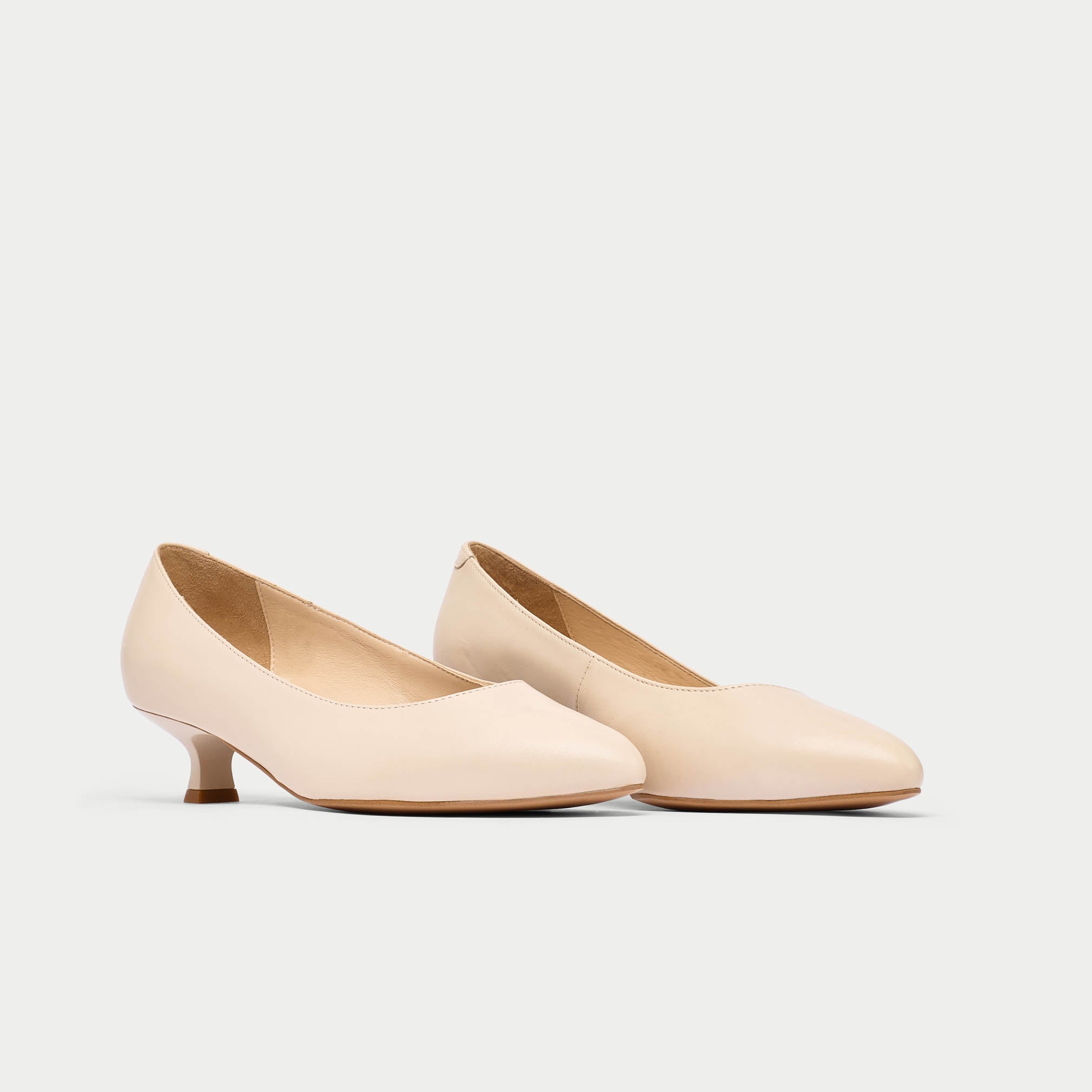 Claudia light beige heels pair