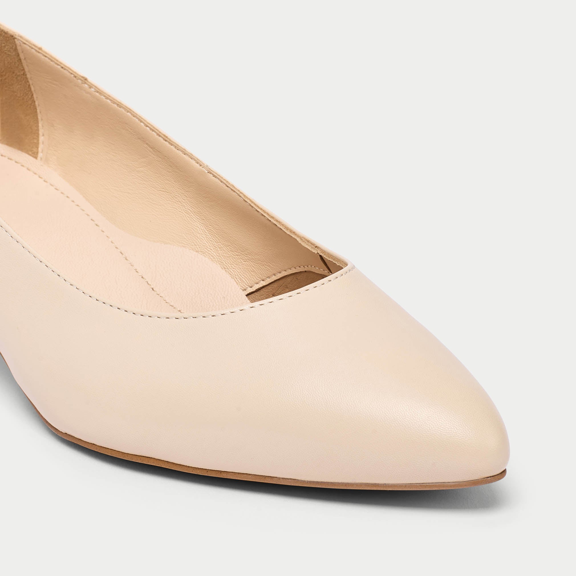 Claudia light beige heels tip close up
