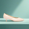 Claudia light beige court heel side view