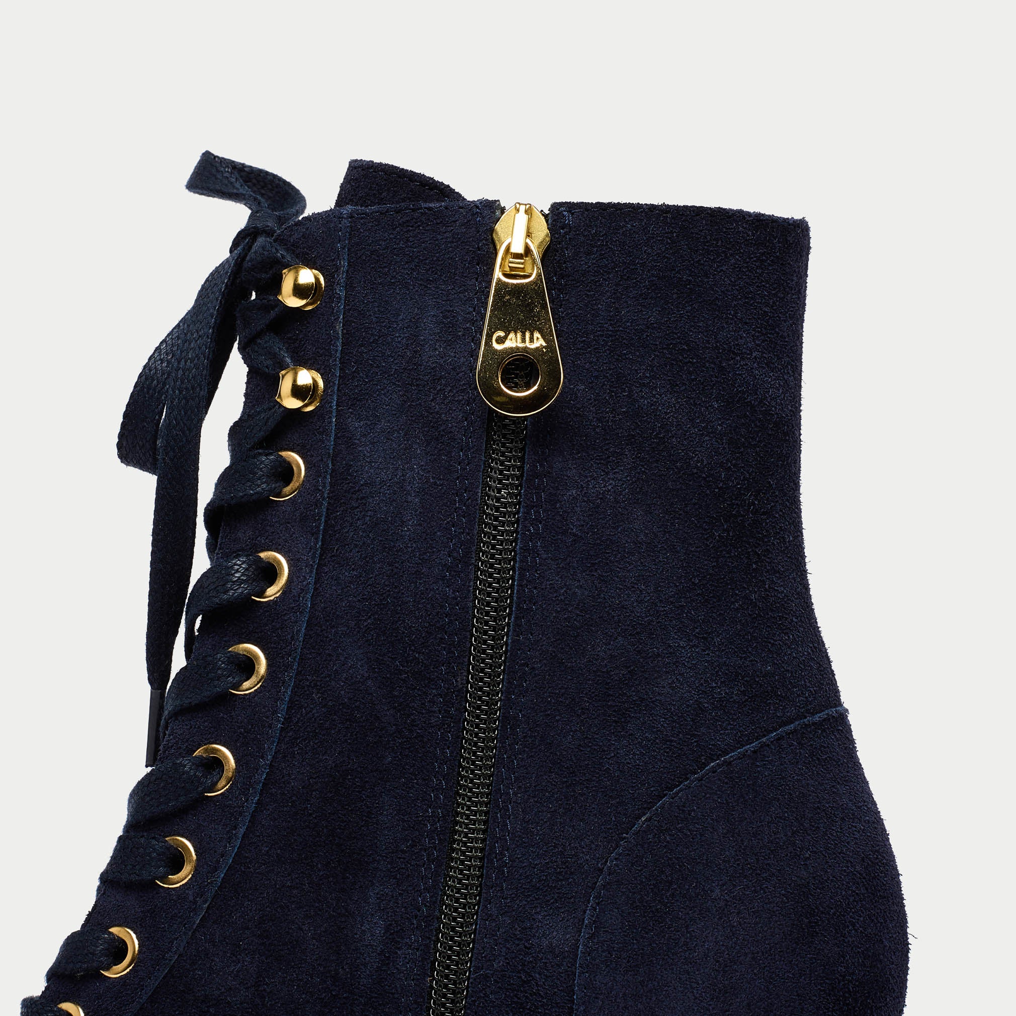 Cleo navy suede gold zip close up