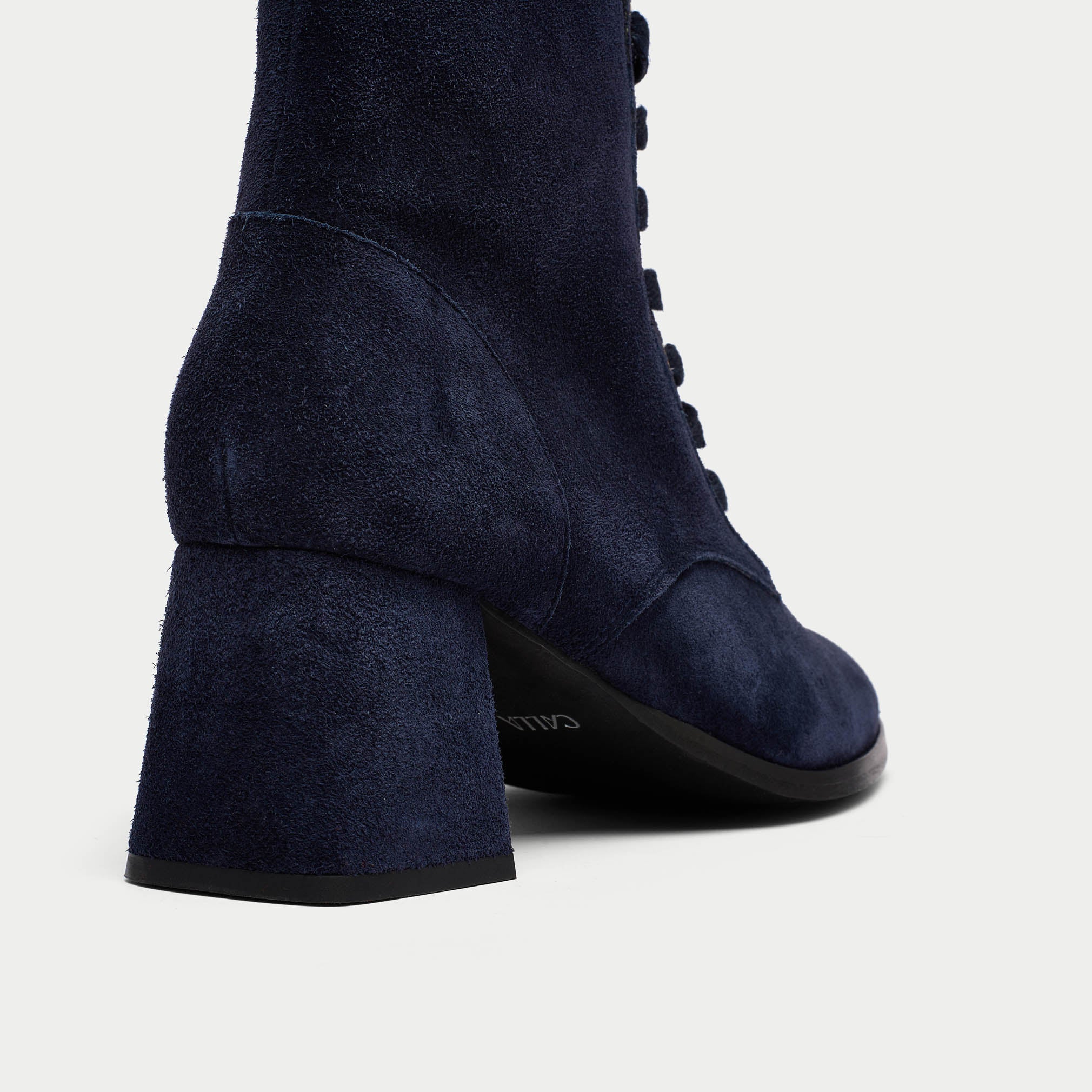 Cleo navy suede heel close up
