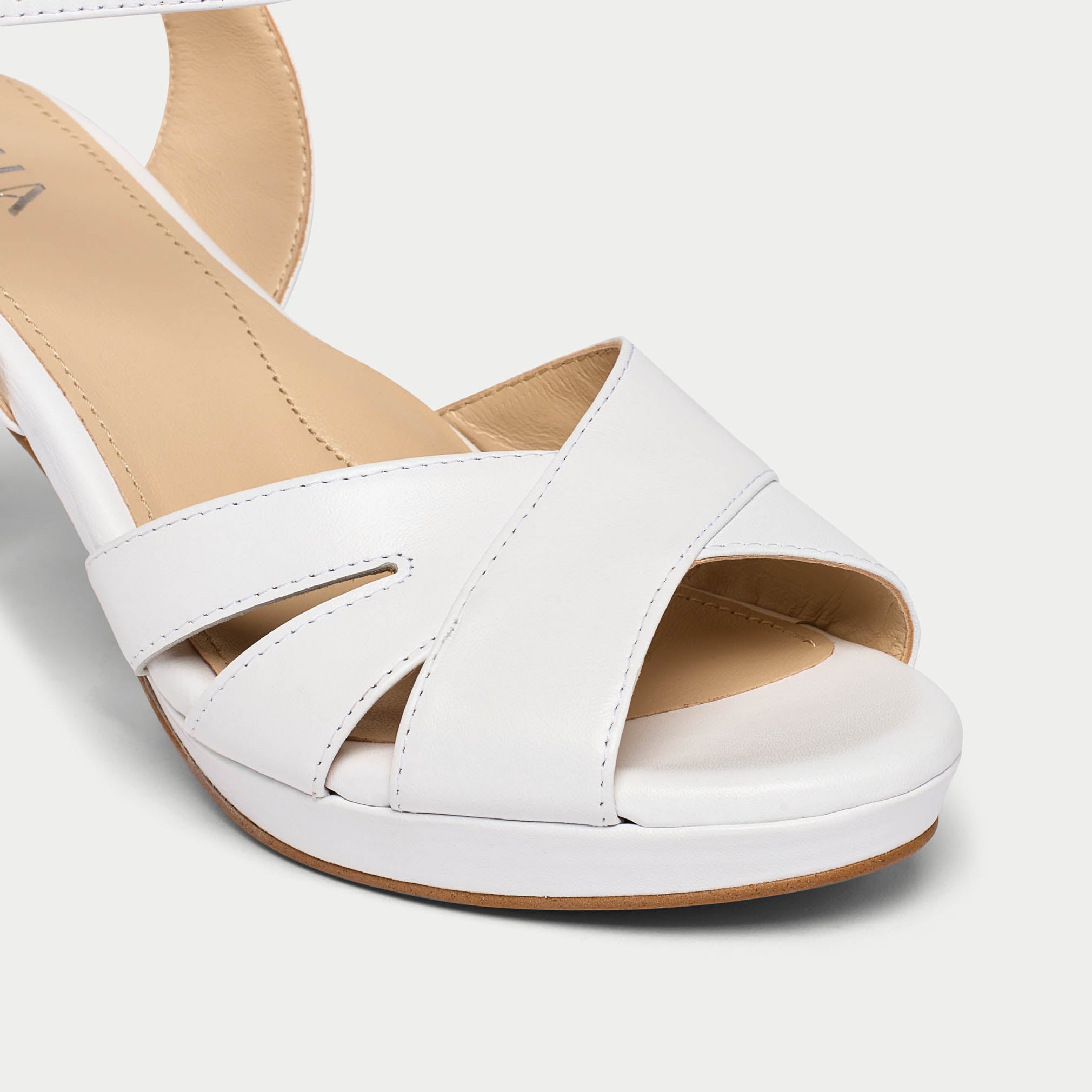 Emily white leather diamante buckle heel tip close up
