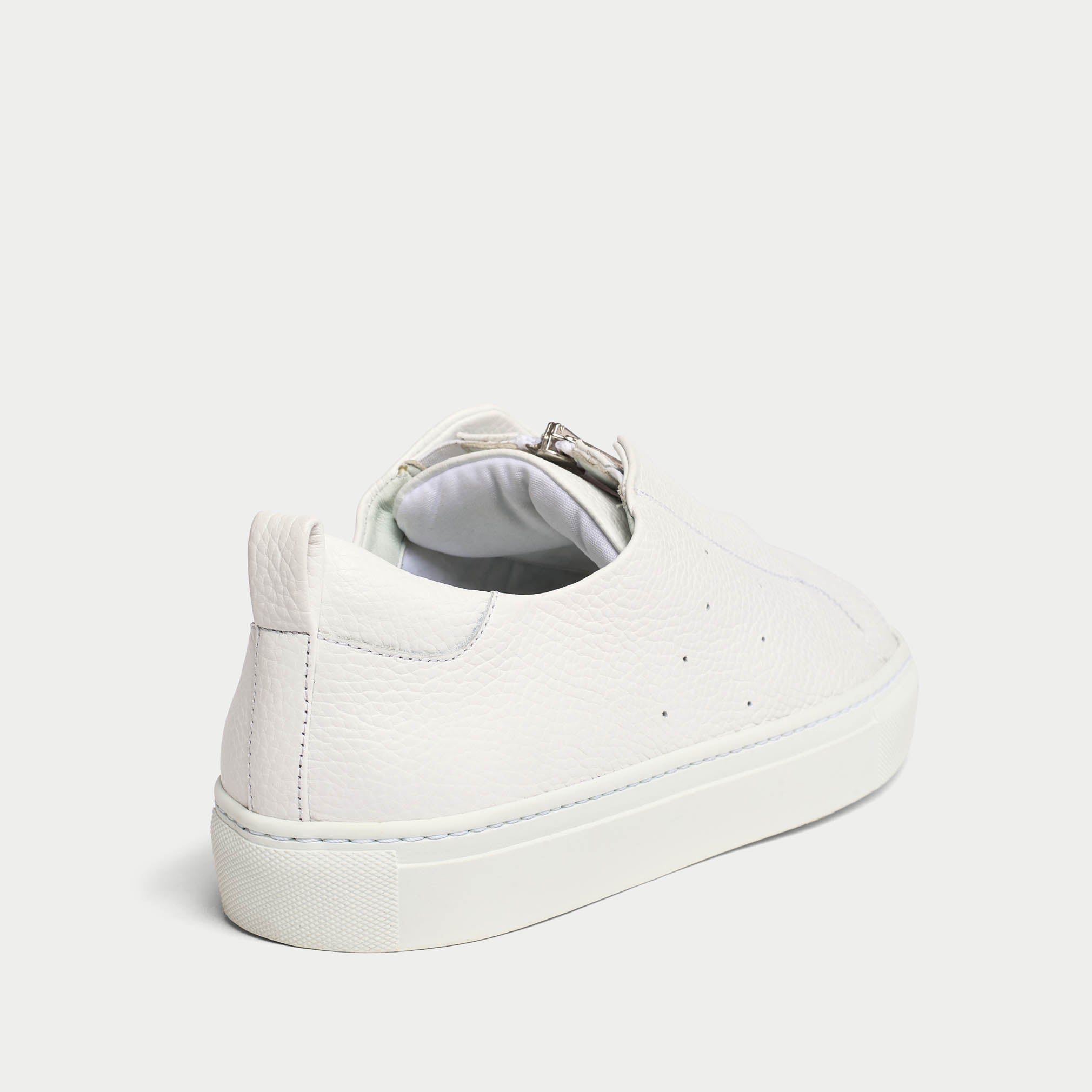 Estella white sneakers back view