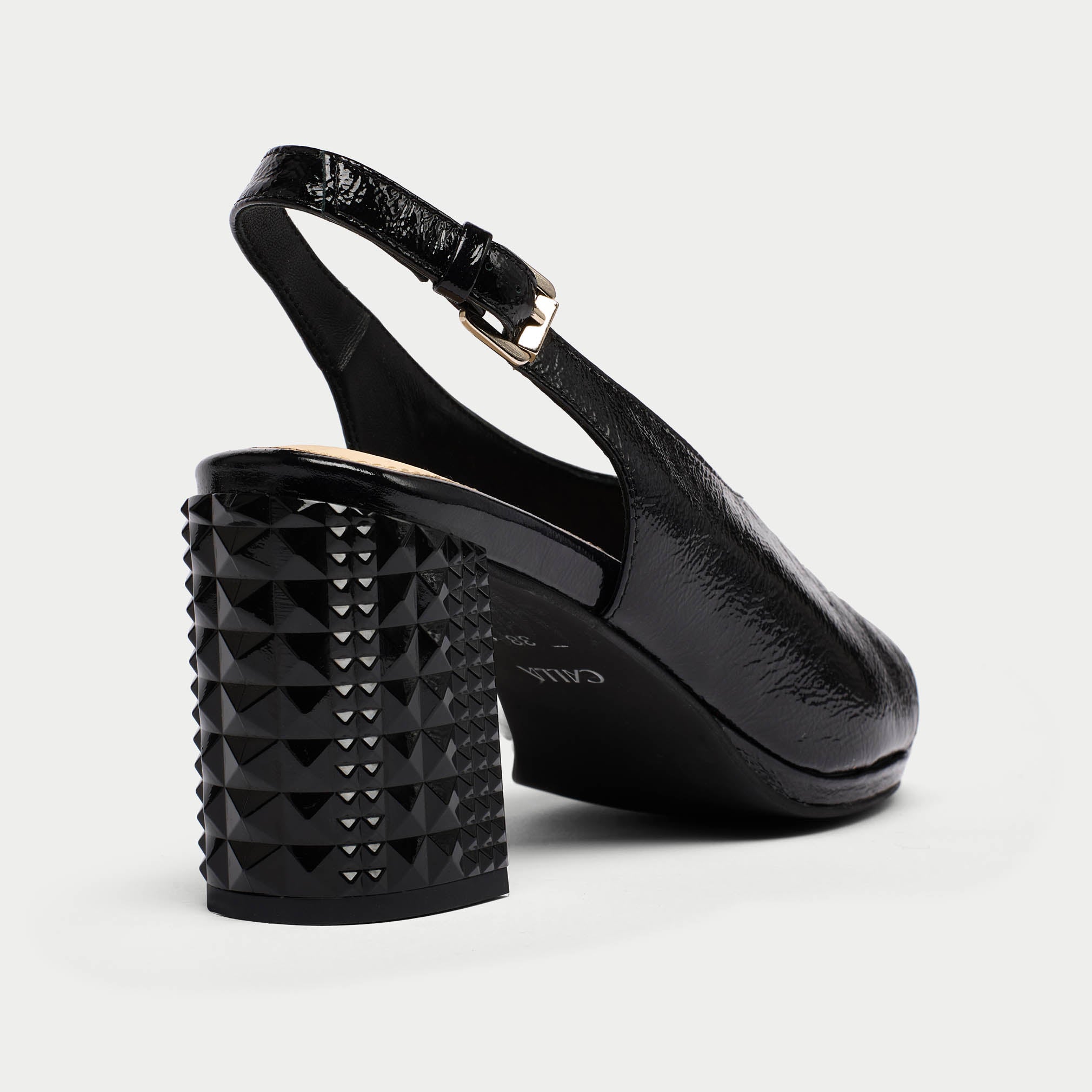 Fern black patent sandal heel close up