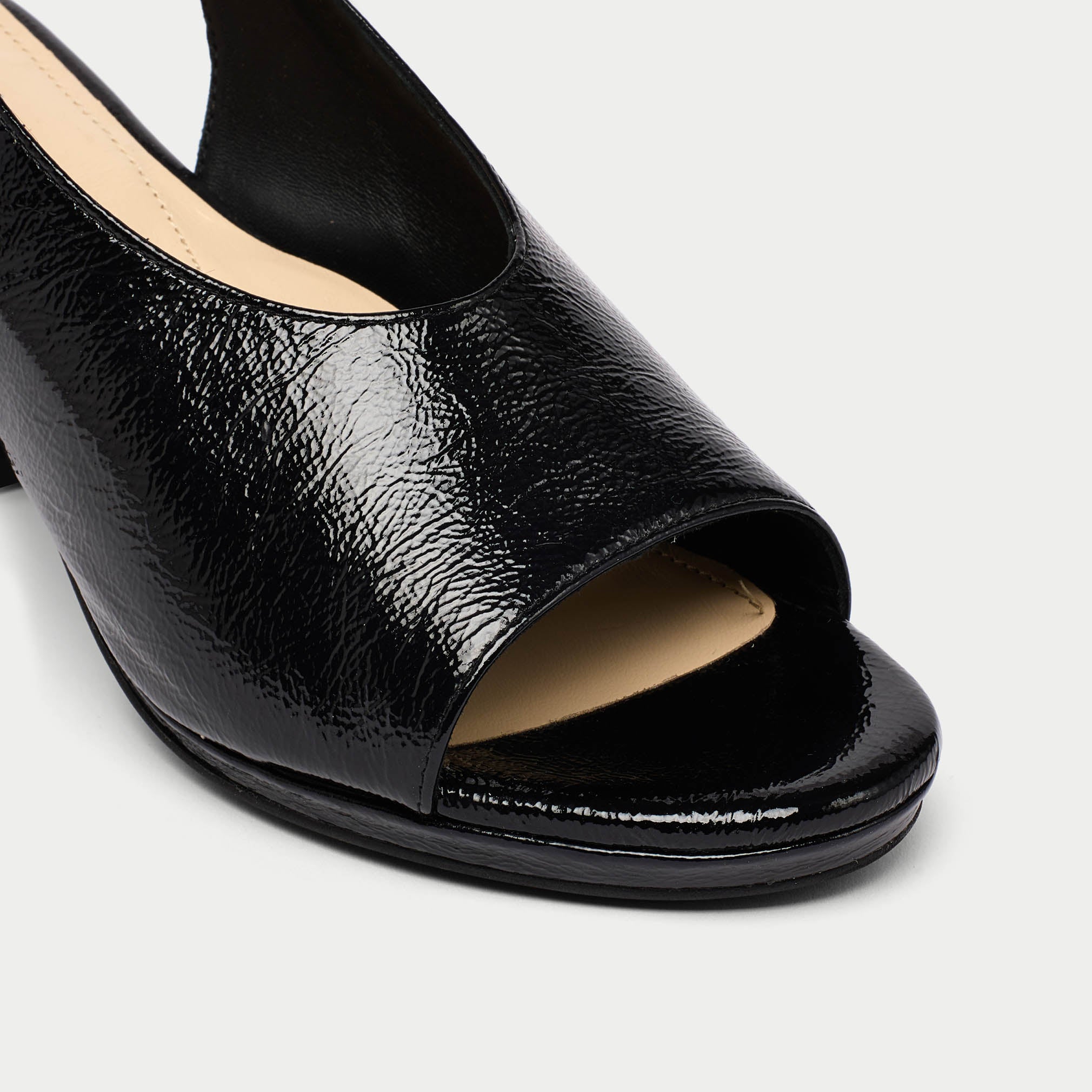 Fern black patent sandal tip close up