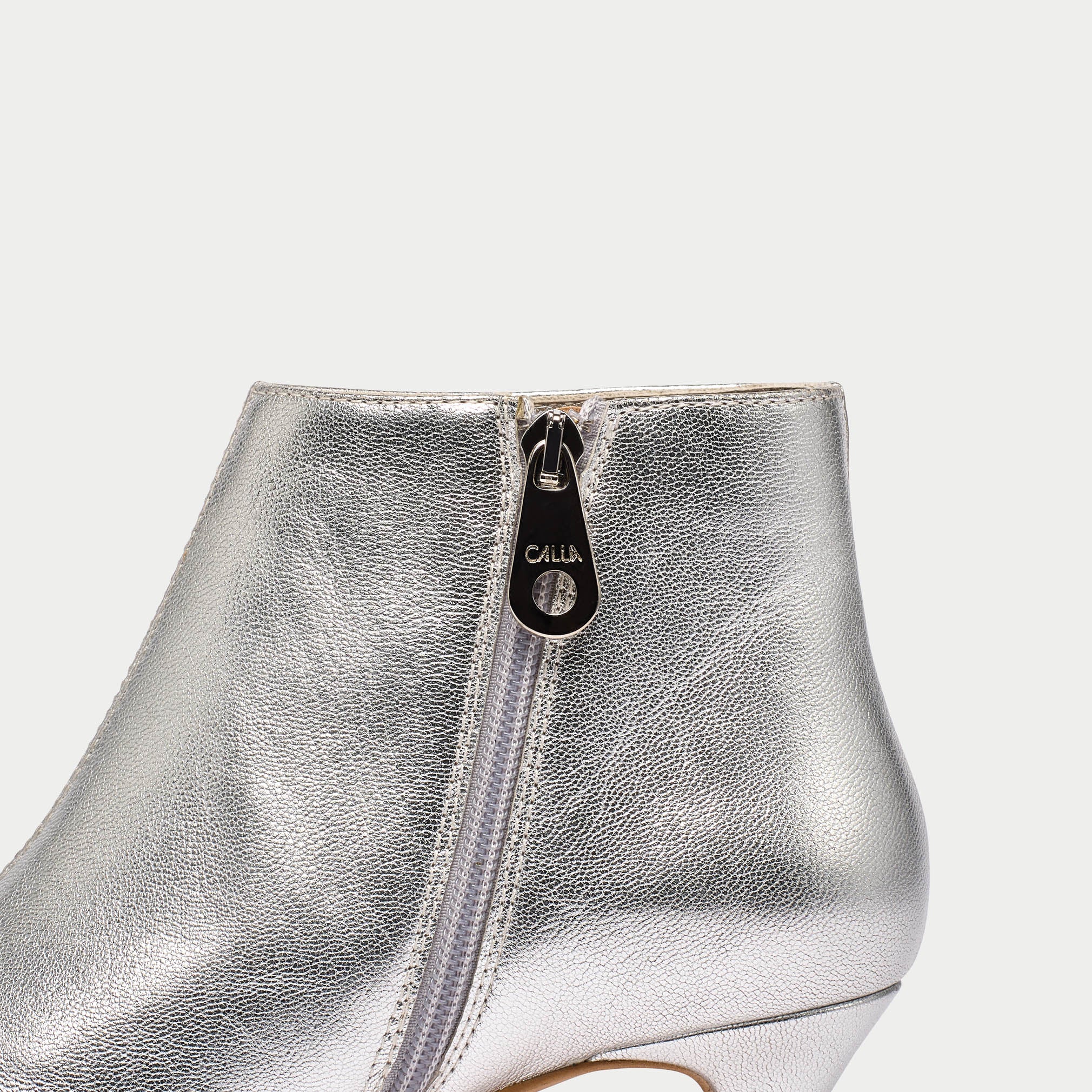 Hazel silver boot zip close up