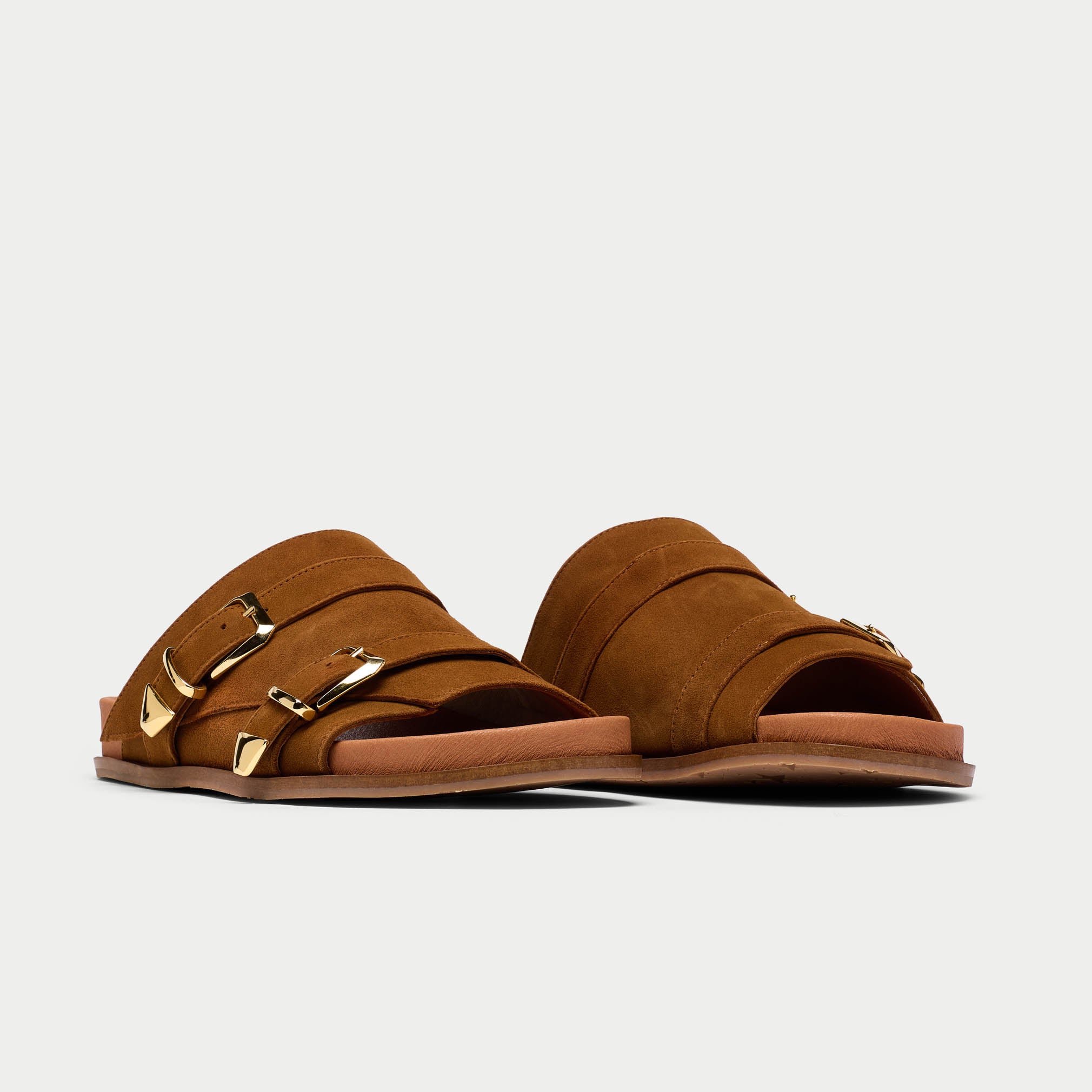 pair of tan suede sandals