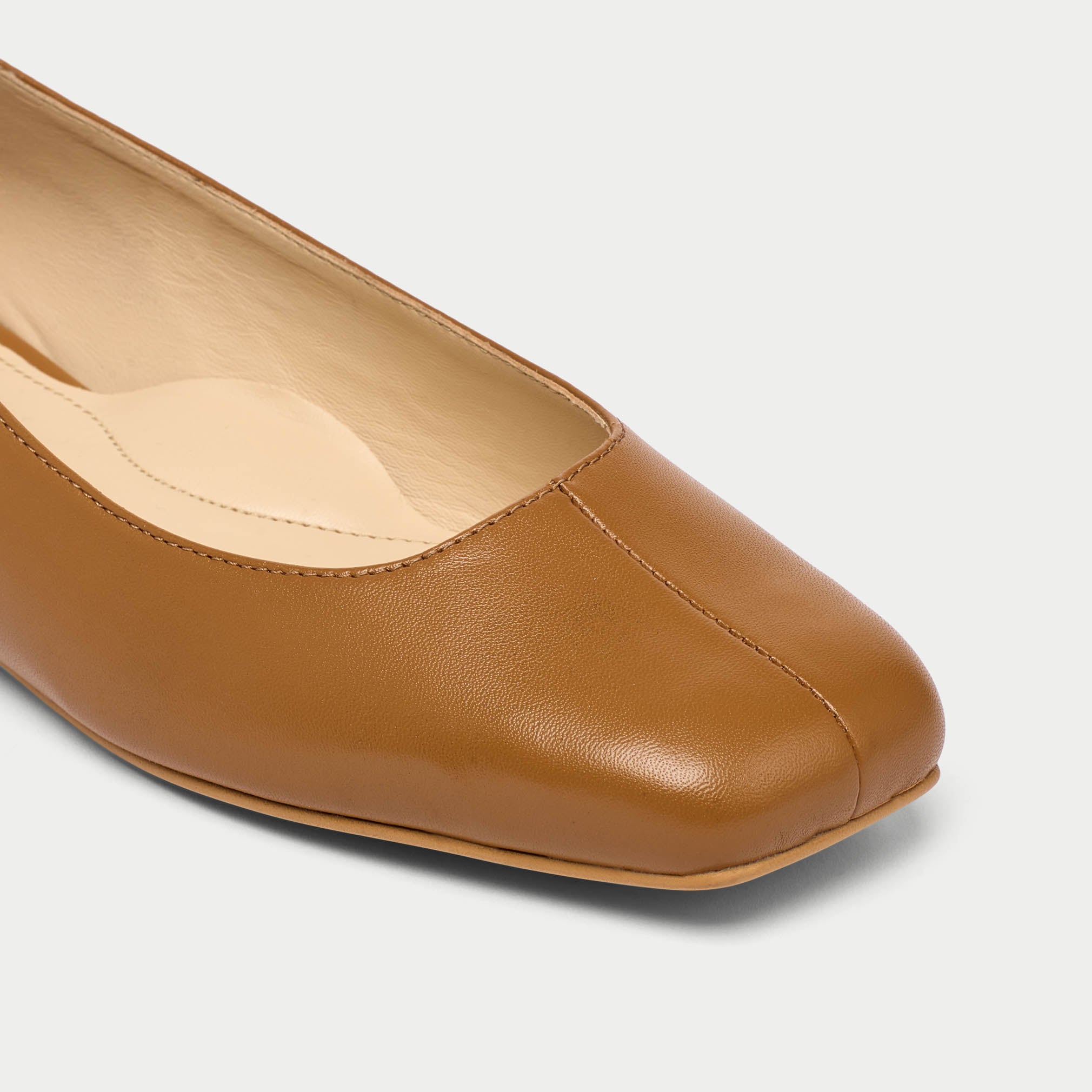 Lucinda tan leather flat shoe tip close up