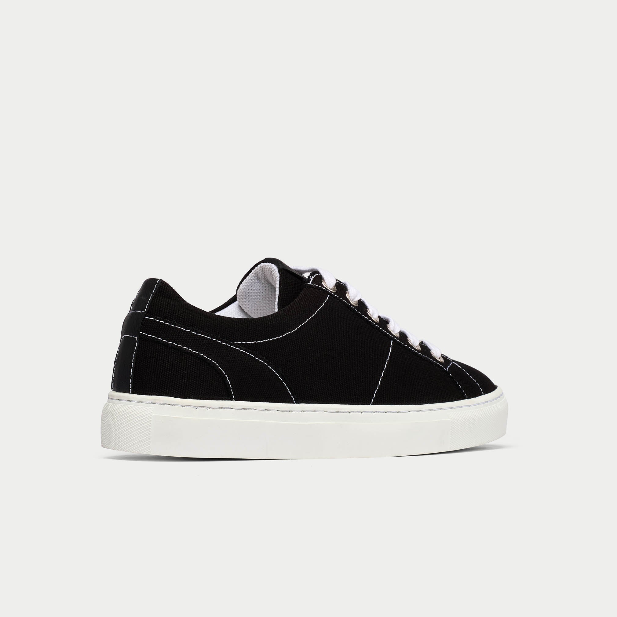 Luna black trainer shoe back/side view