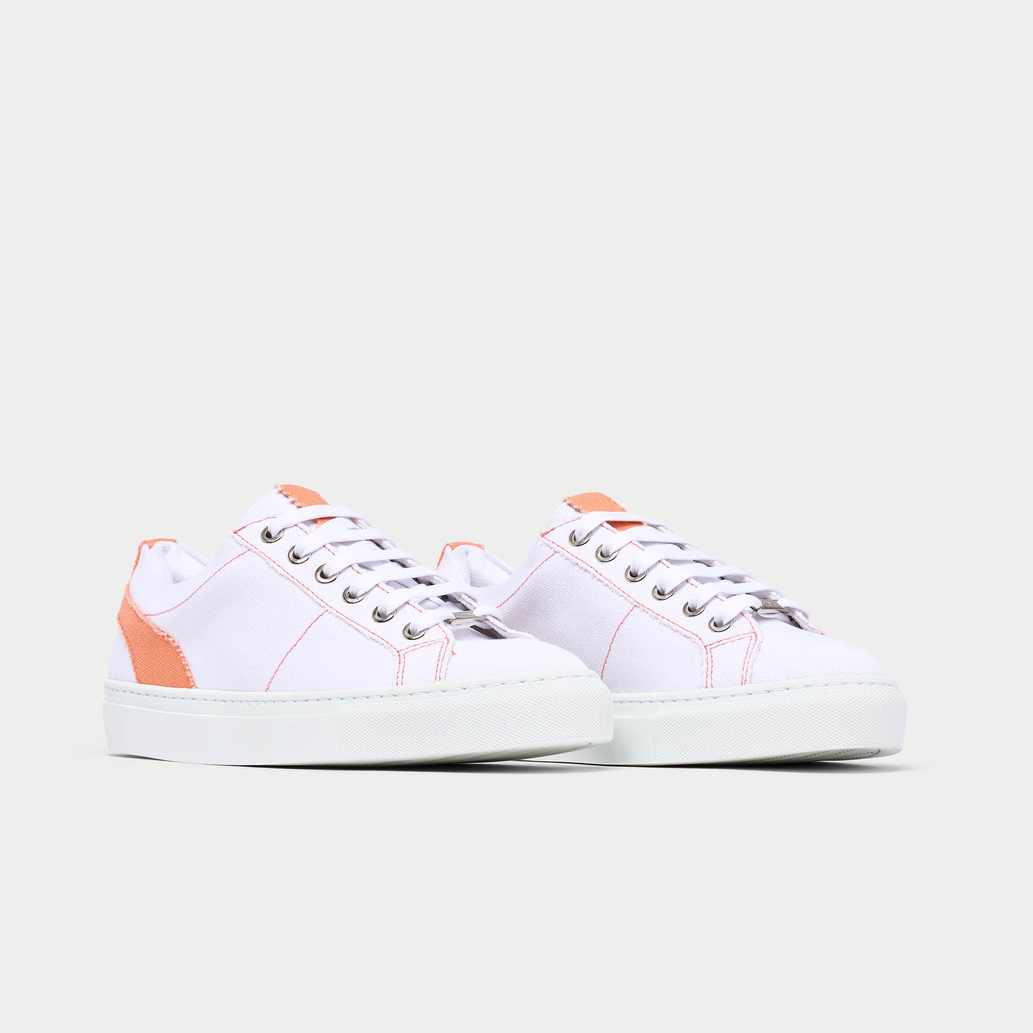 Luna peach trainer shoe pair