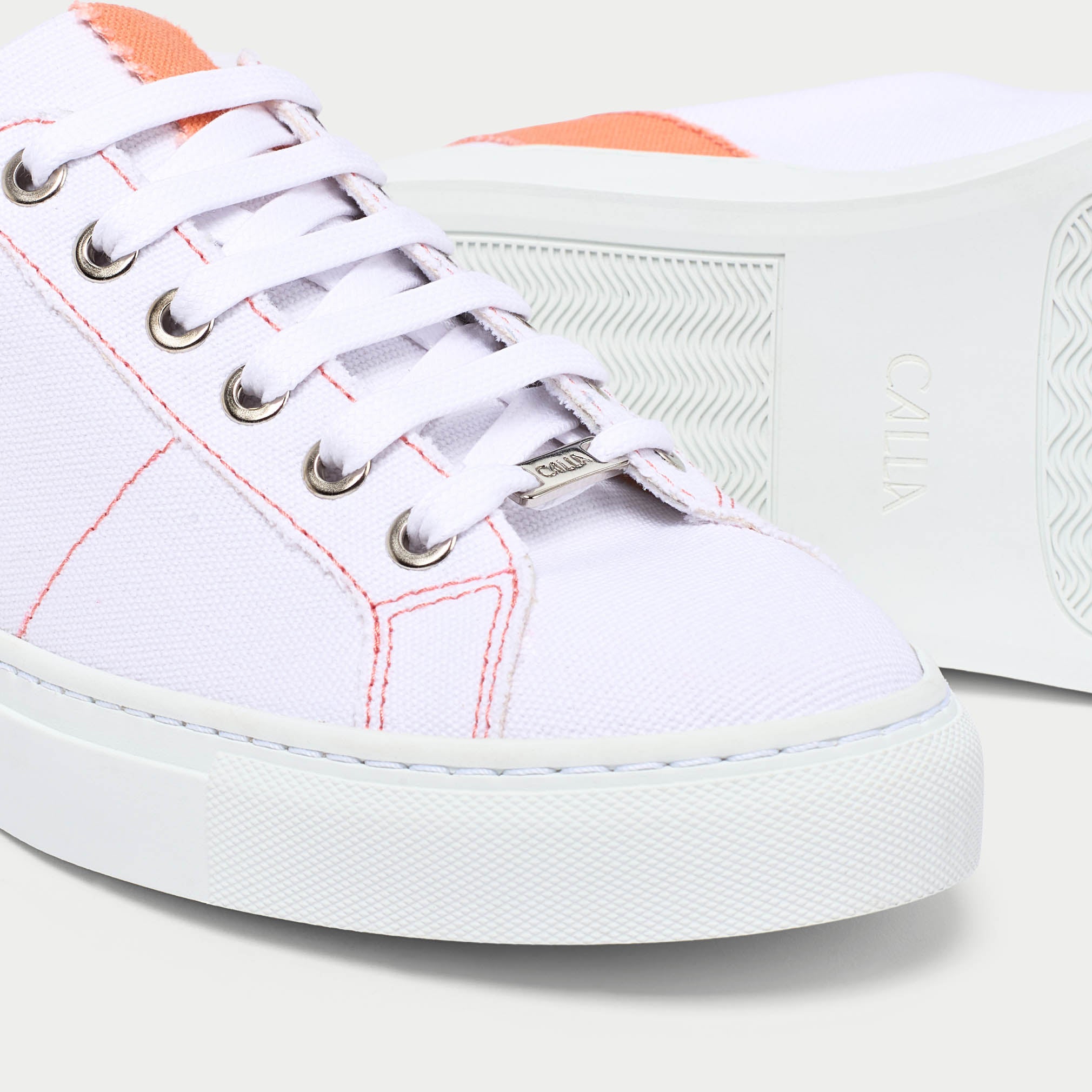 Luna peach trainer shoe tip close up