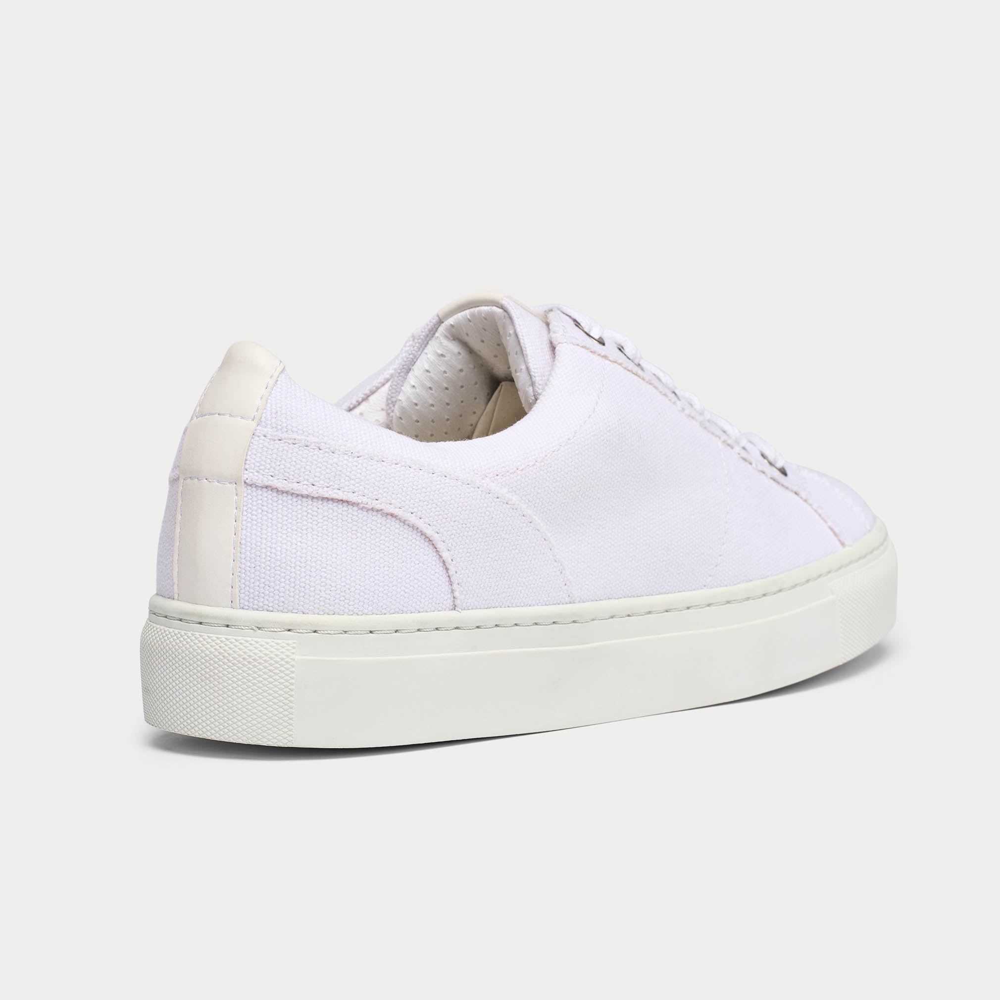 Luna white trainer shoe back view