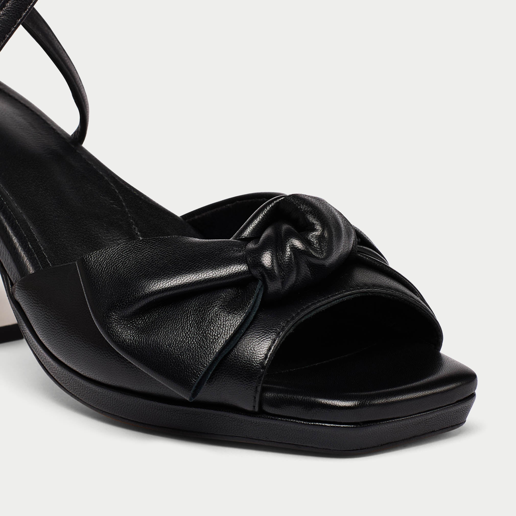 Lydia black leather sandal shoe tip close up