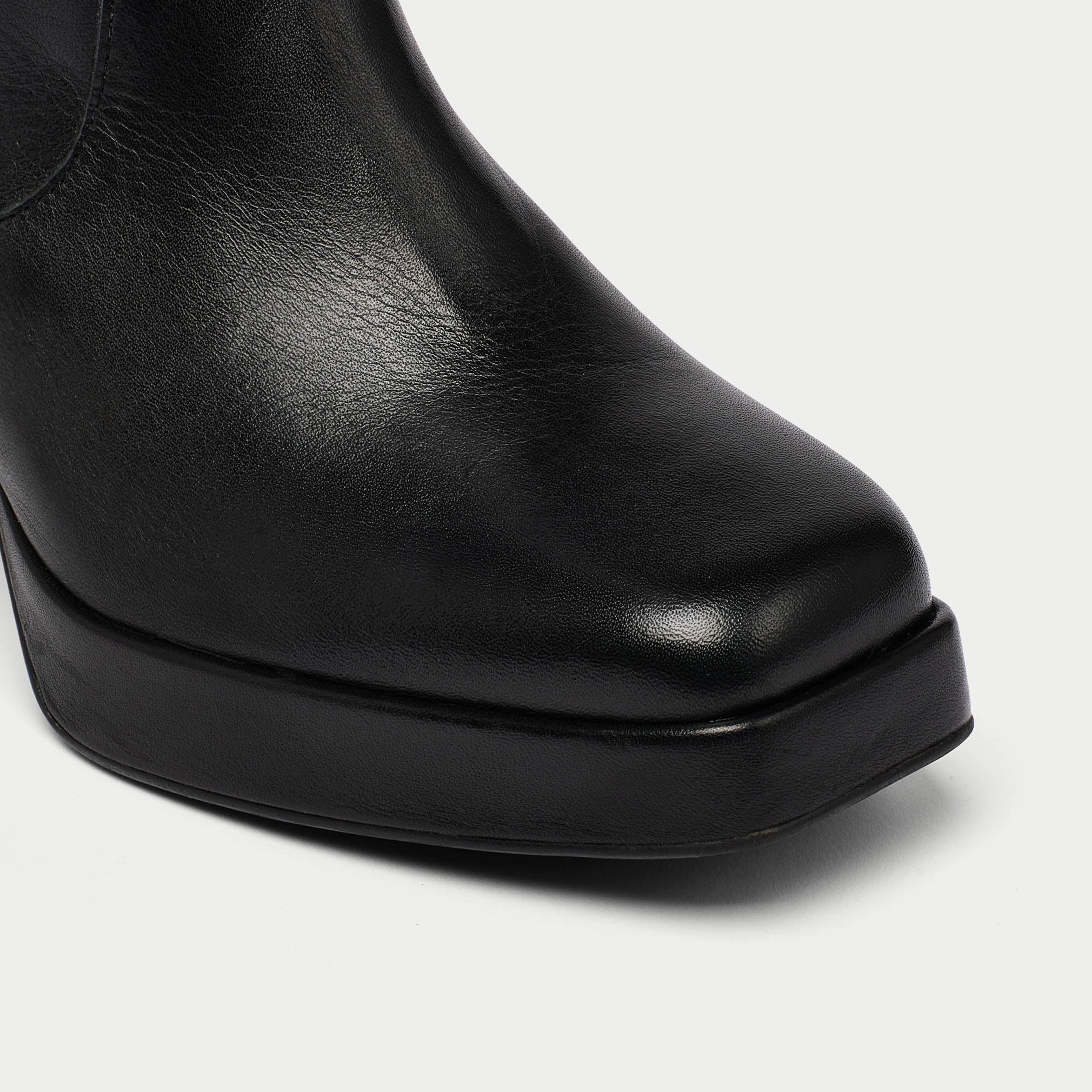 Martha black boot tip close up