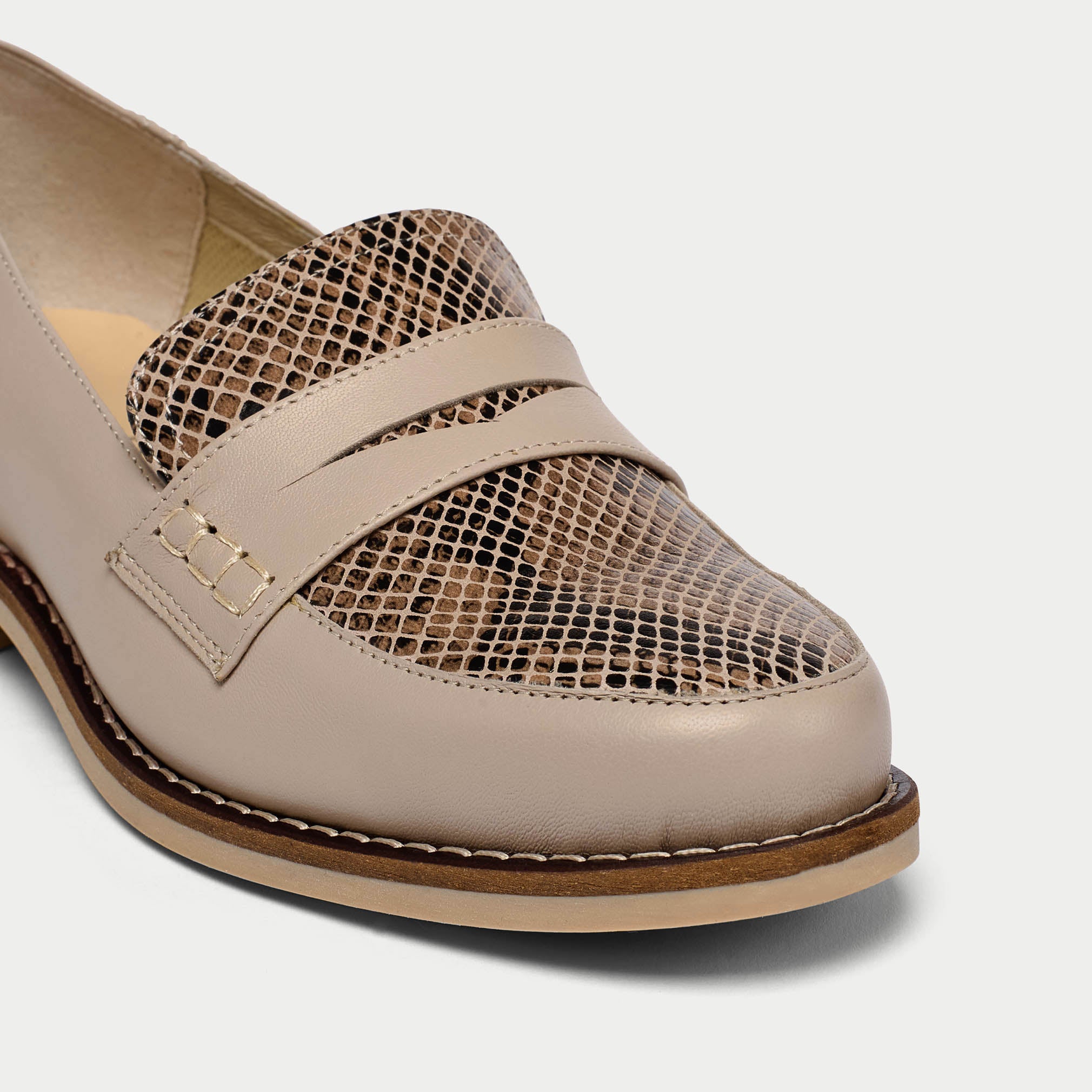 close up of snake print loafers for bunions