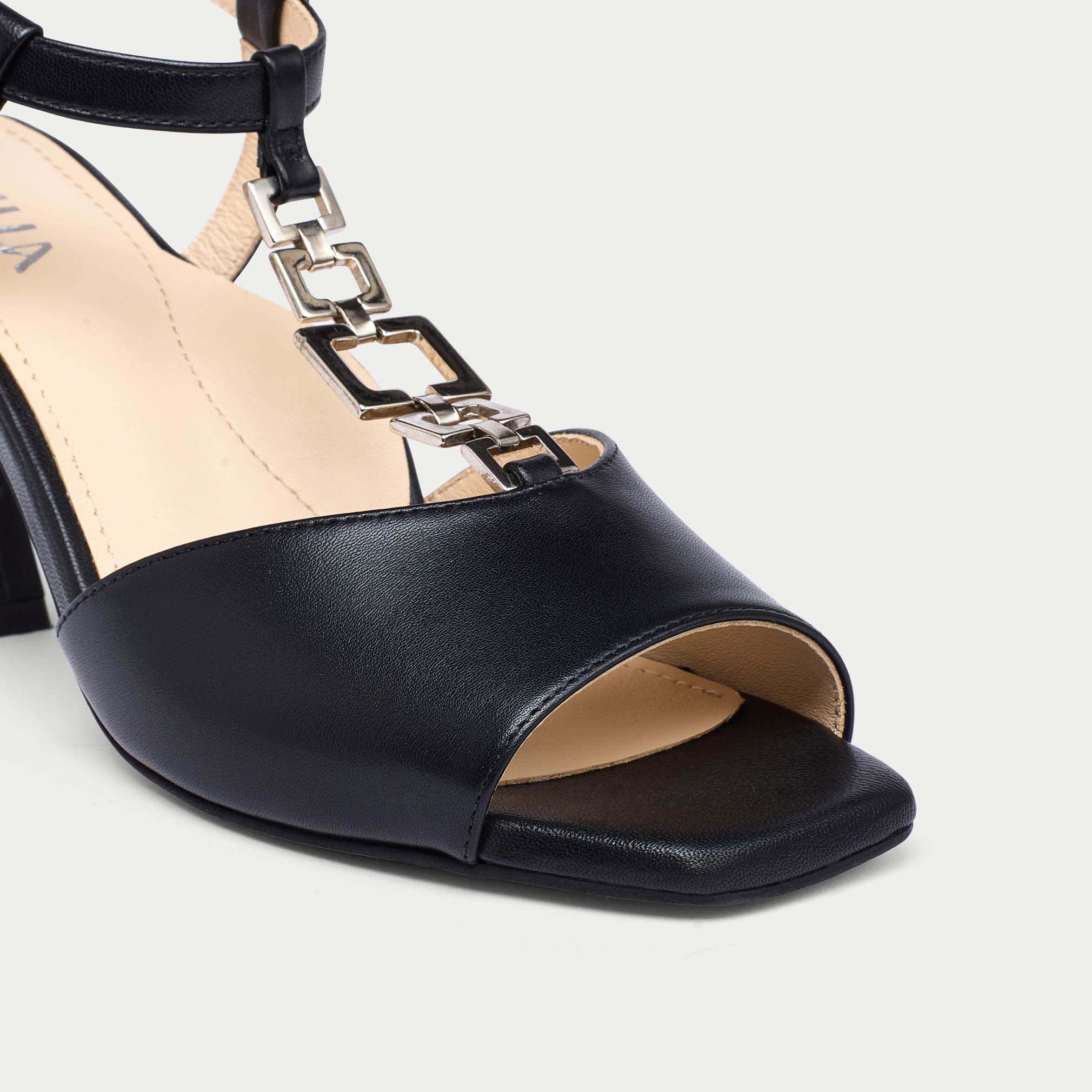Pamela black sandal heel tip close up