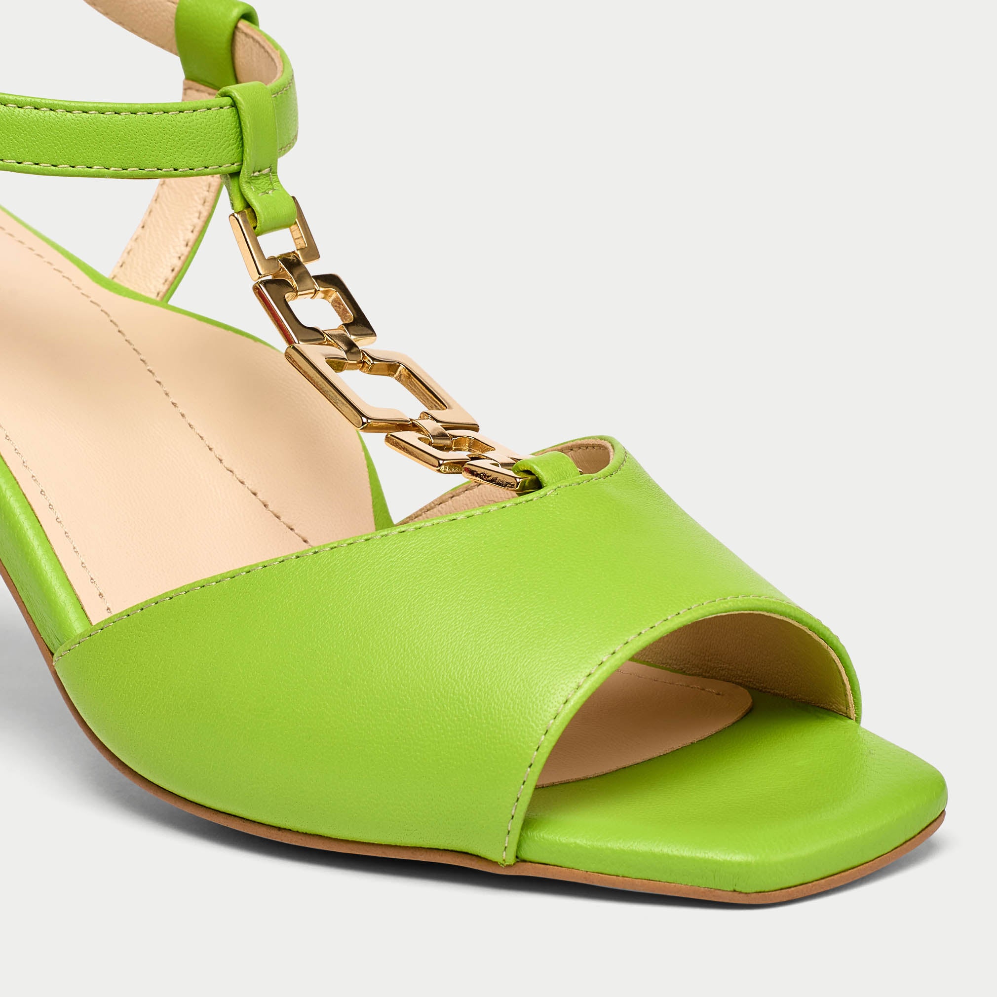 Pamela lime green sandal heel tip close up