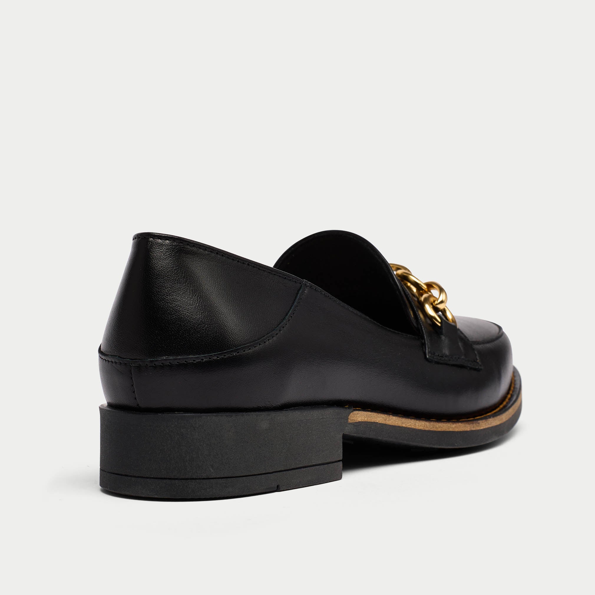 Rebecca black leather loafer heel close up