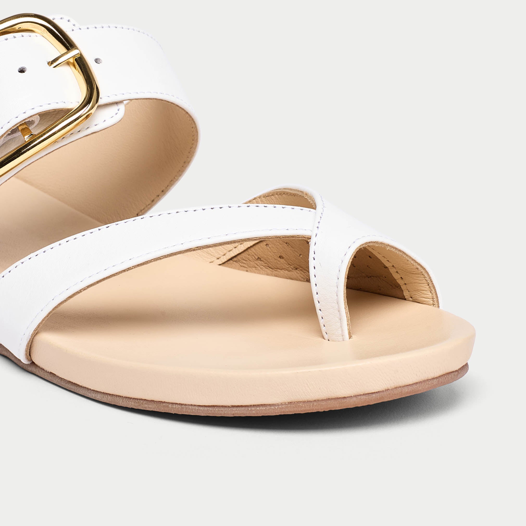 Ruby white leather sandal tip close up