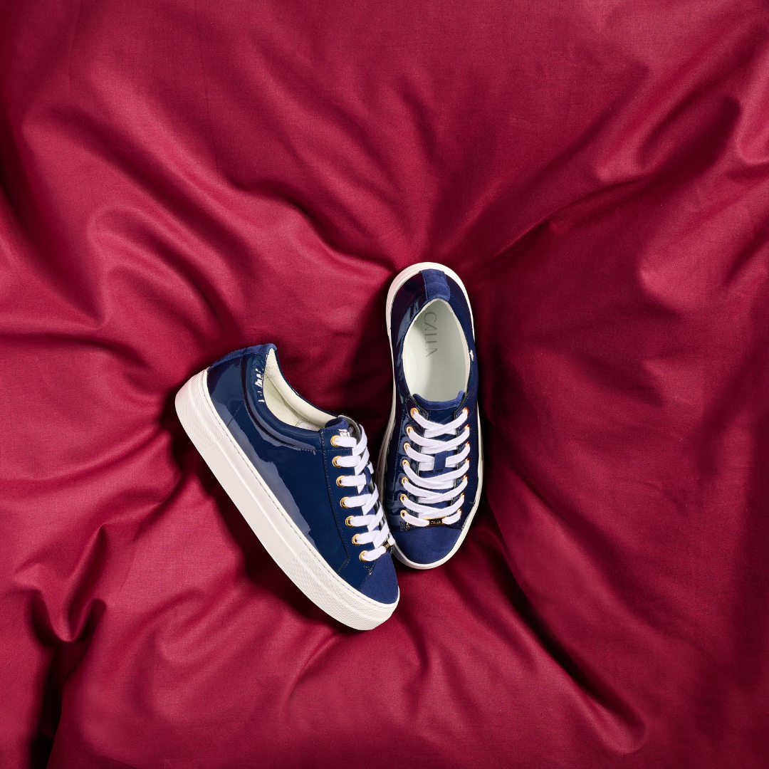 Saturn navy leather pair of sneakers for bunions