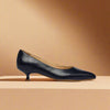 Claudia navy leather heel side view