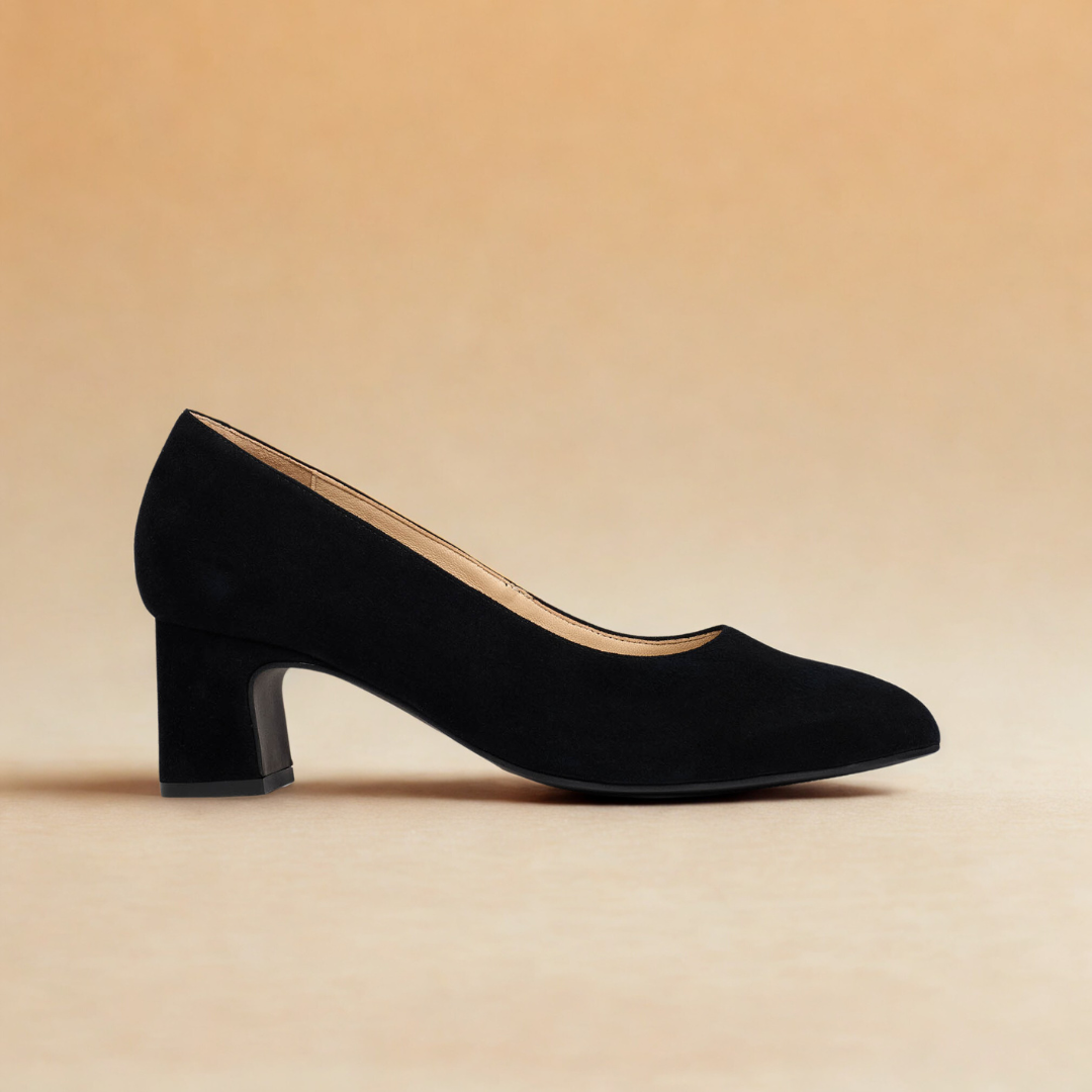 black block heels on light orange background