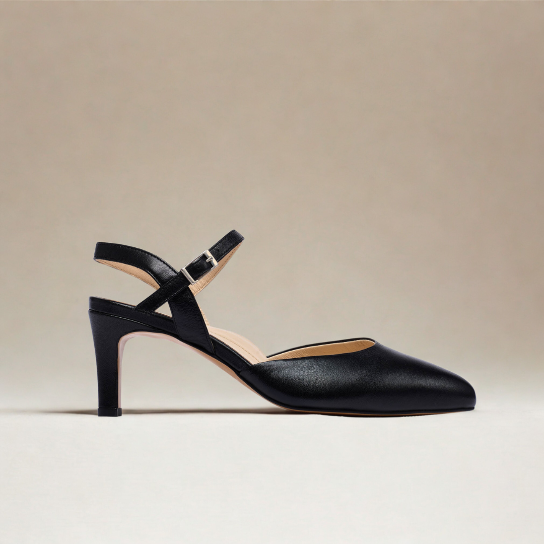 black leather comfortable heels for bunions on light background