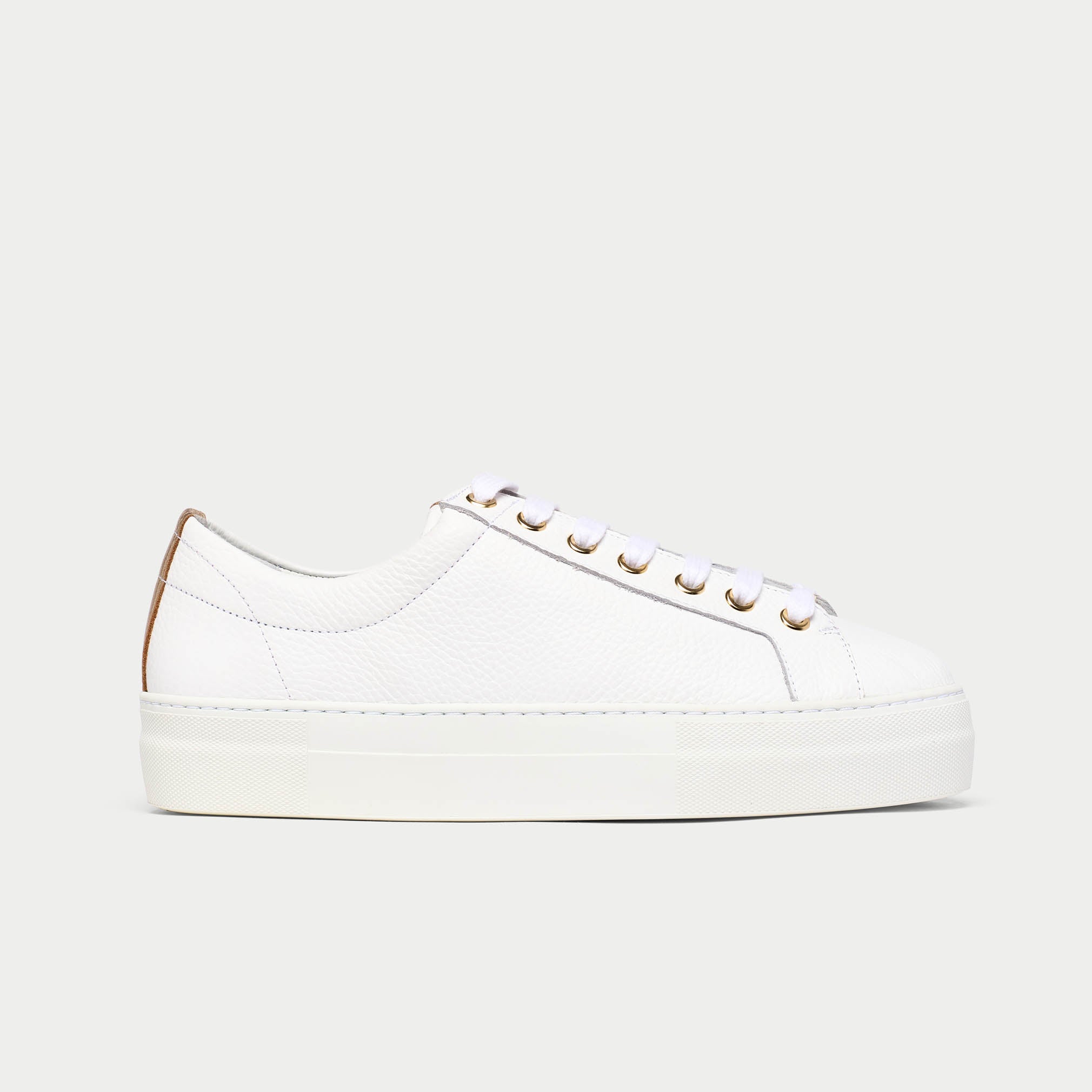 White saturn sneaker on a light gray background side view