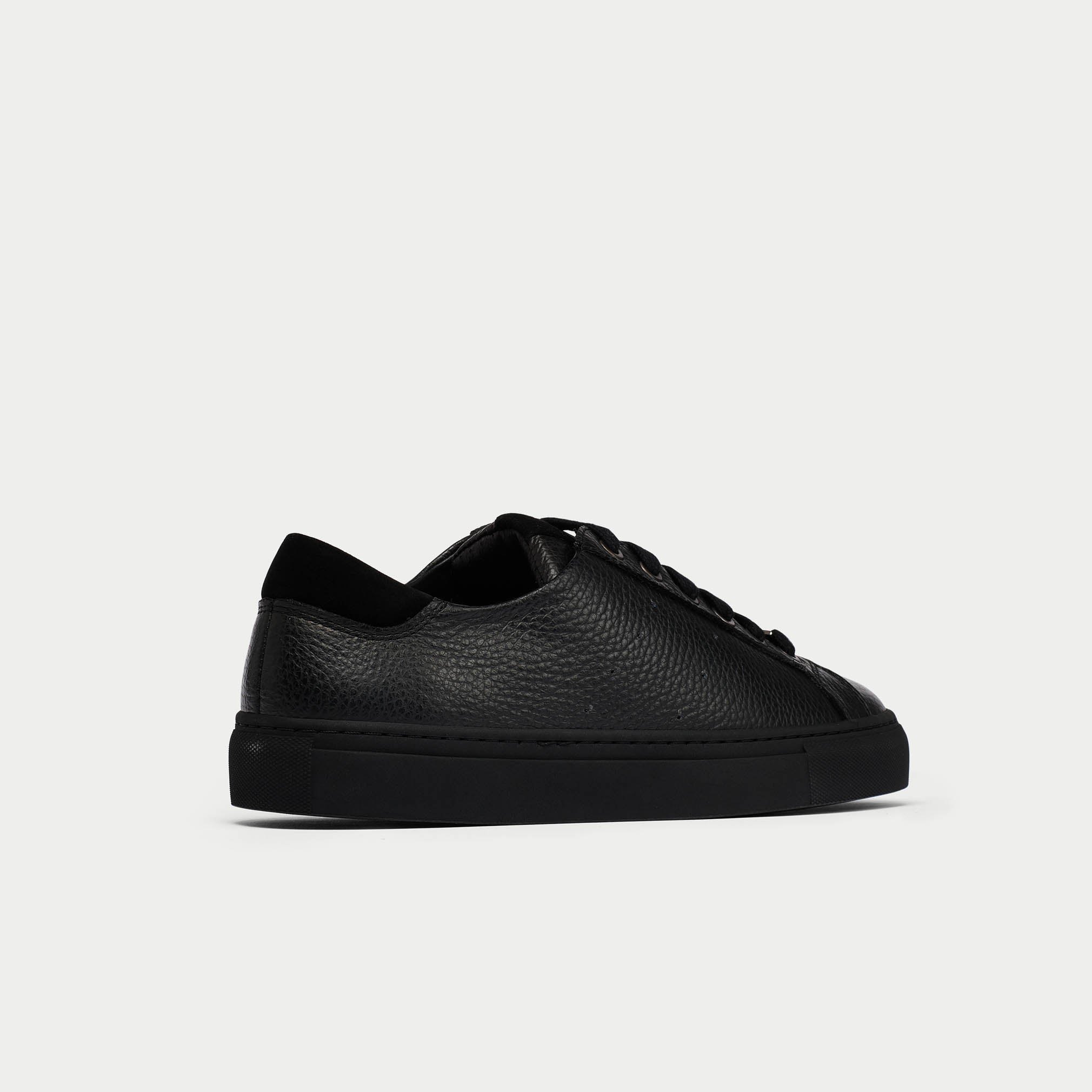 Star black leather sneaker back view