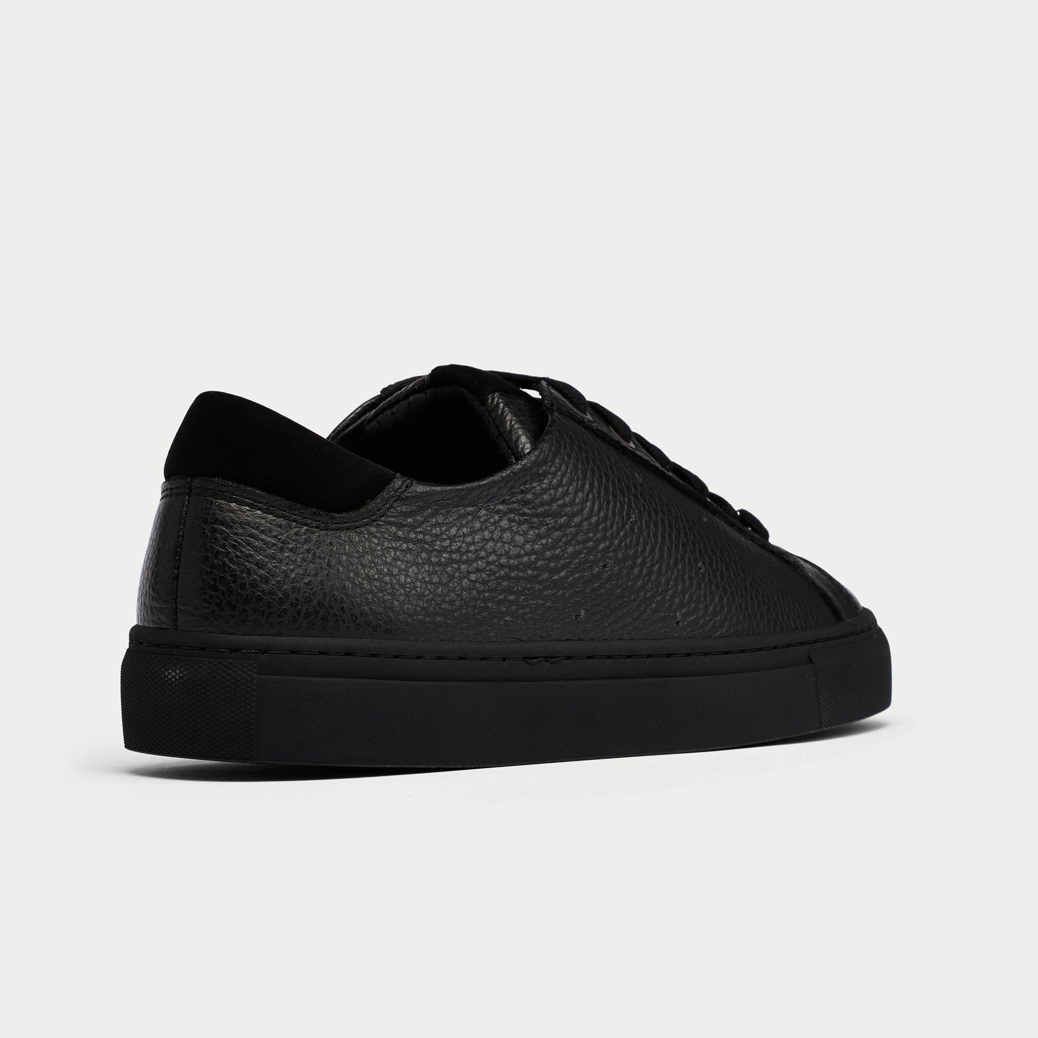 Star black leather sneaker back view