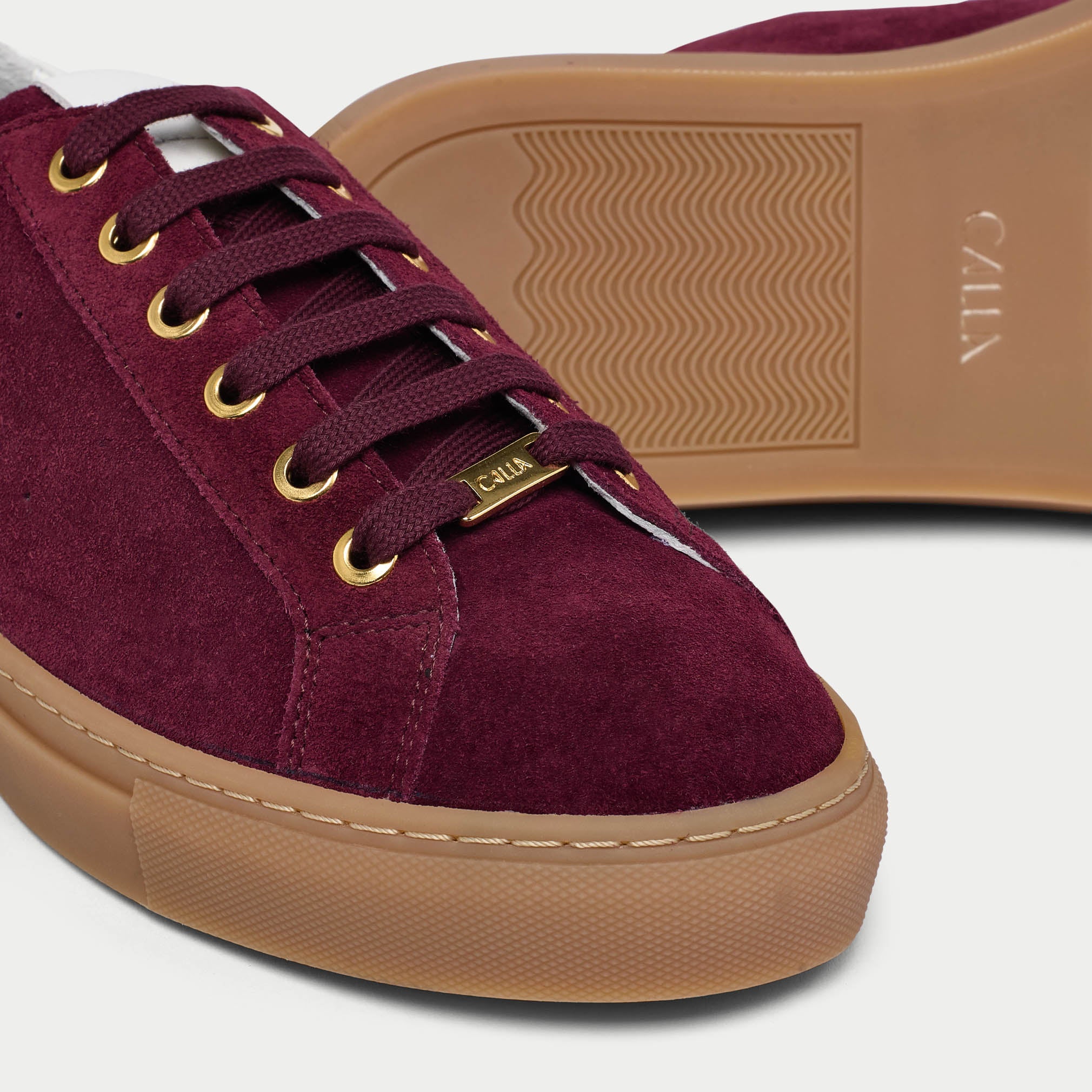star cherry sneakers with tan soles tip close-up