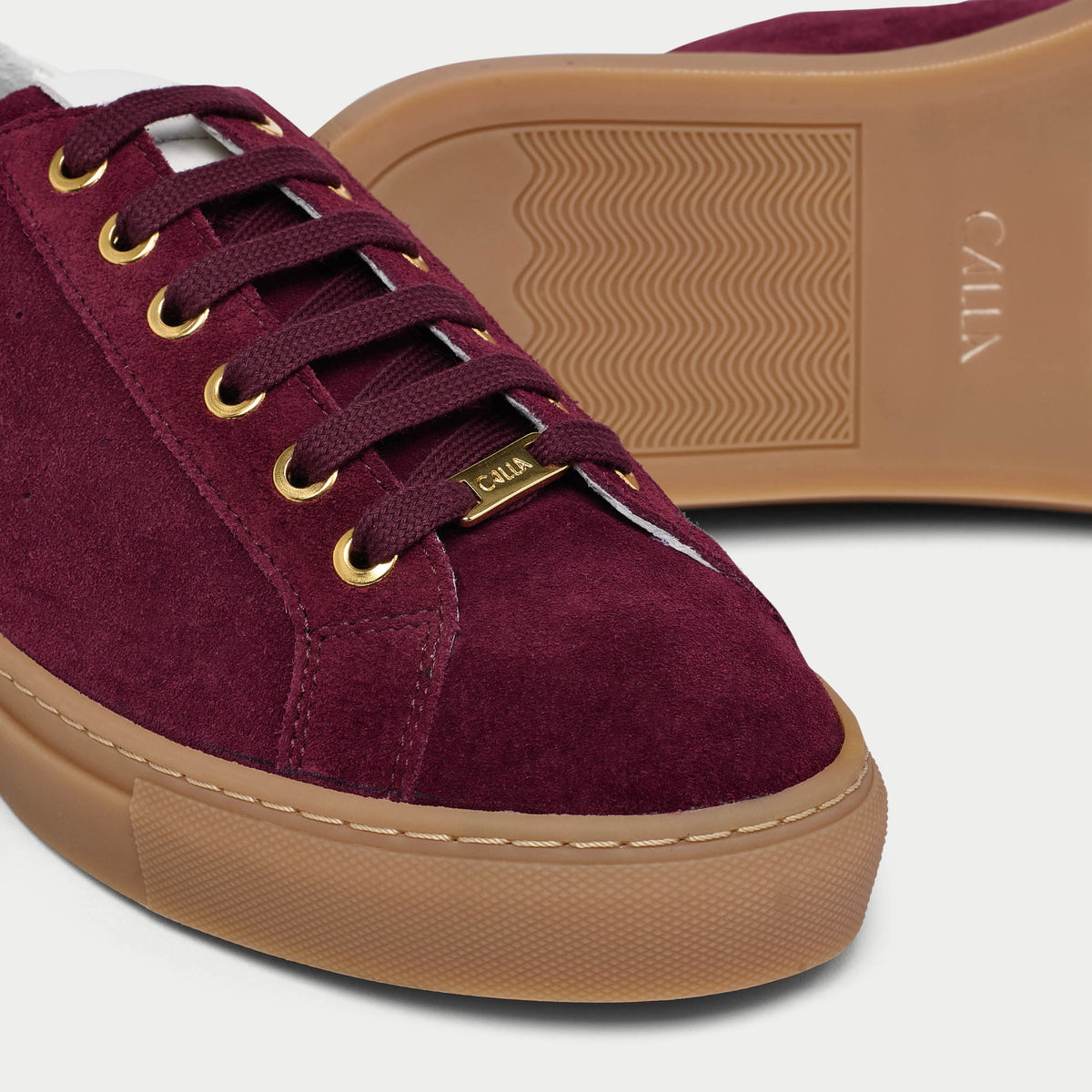 star cherry sneakers with tan soles tip close-up
