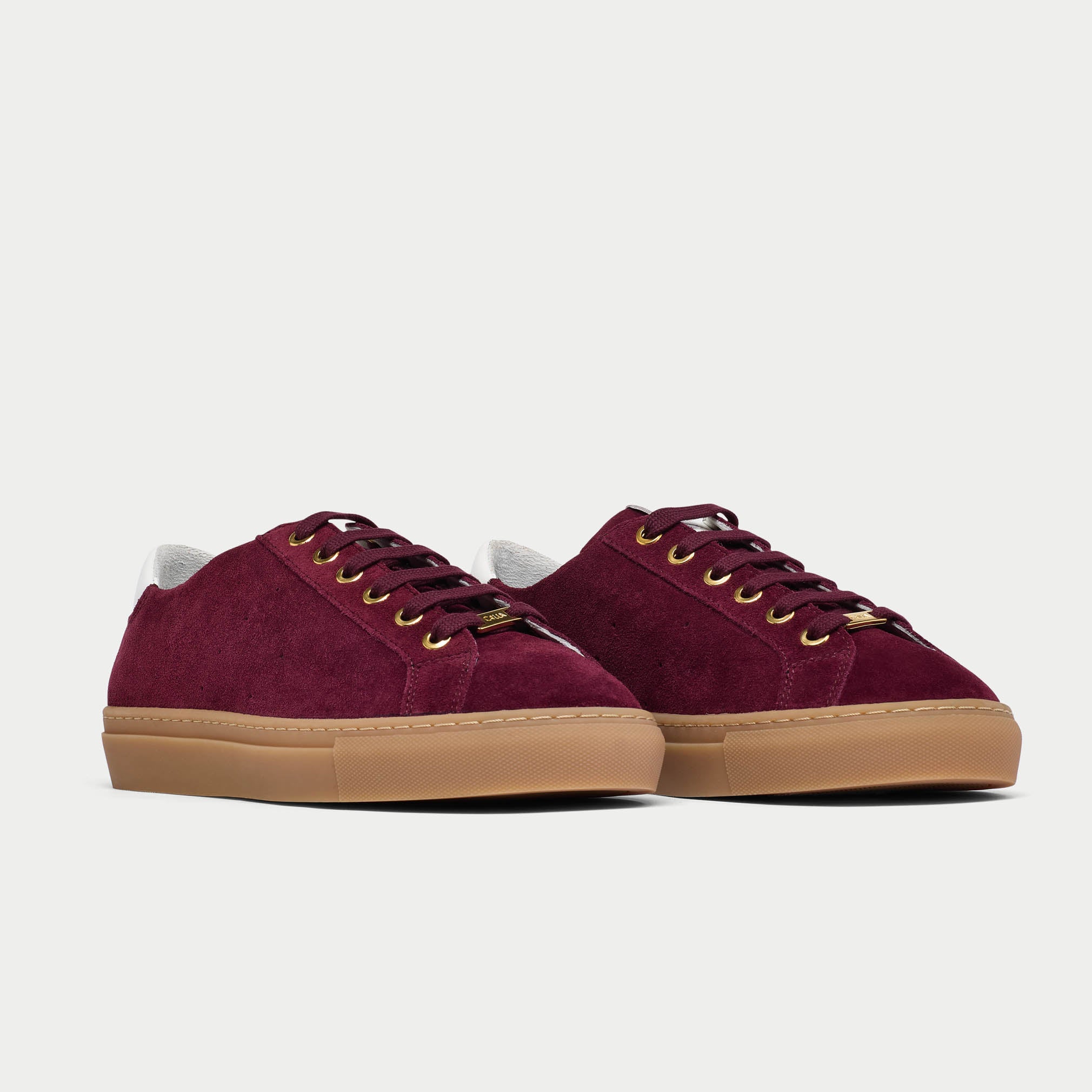 star cherry sneakers with tan soles pair
