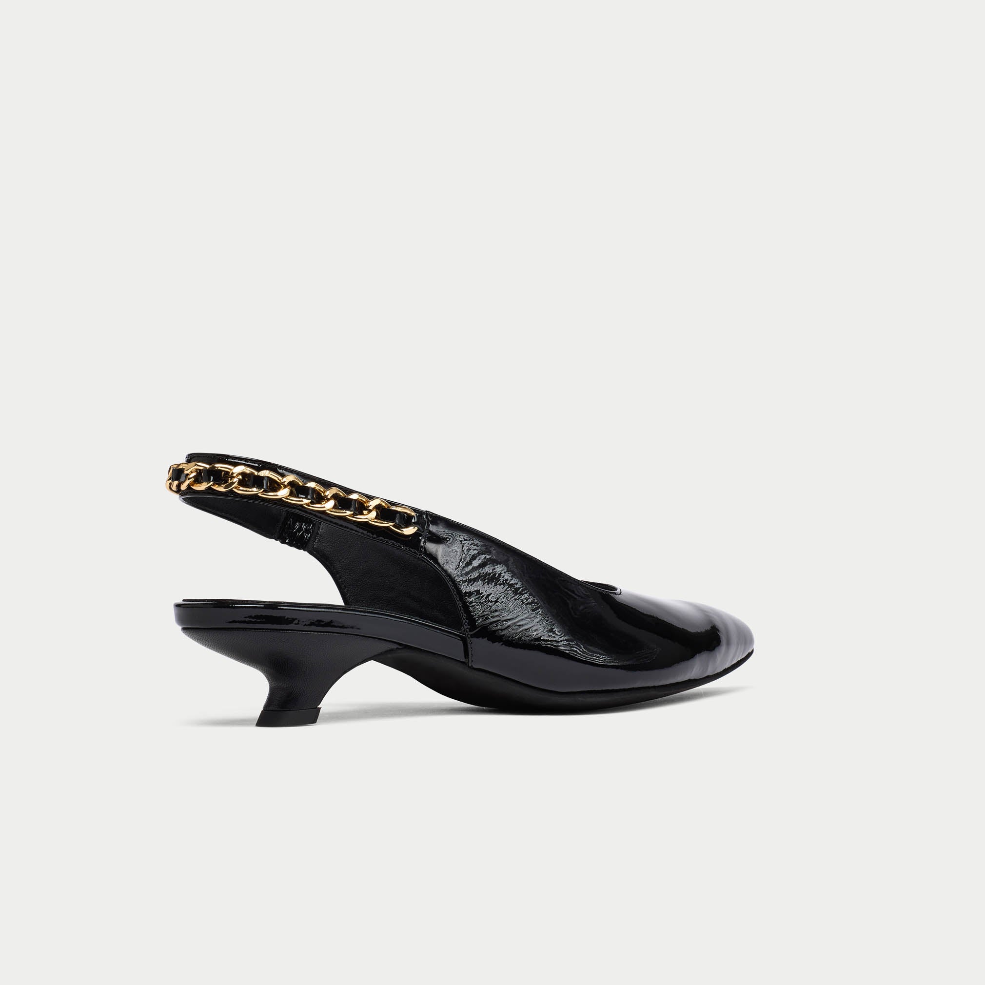 Black Thea slingback with gold chain detail on a white background