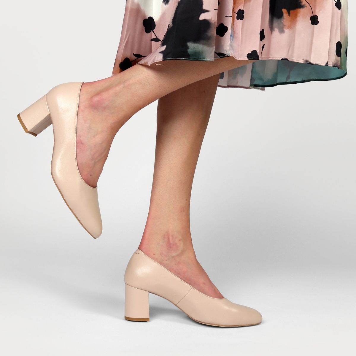 nude leather court shoe on feet