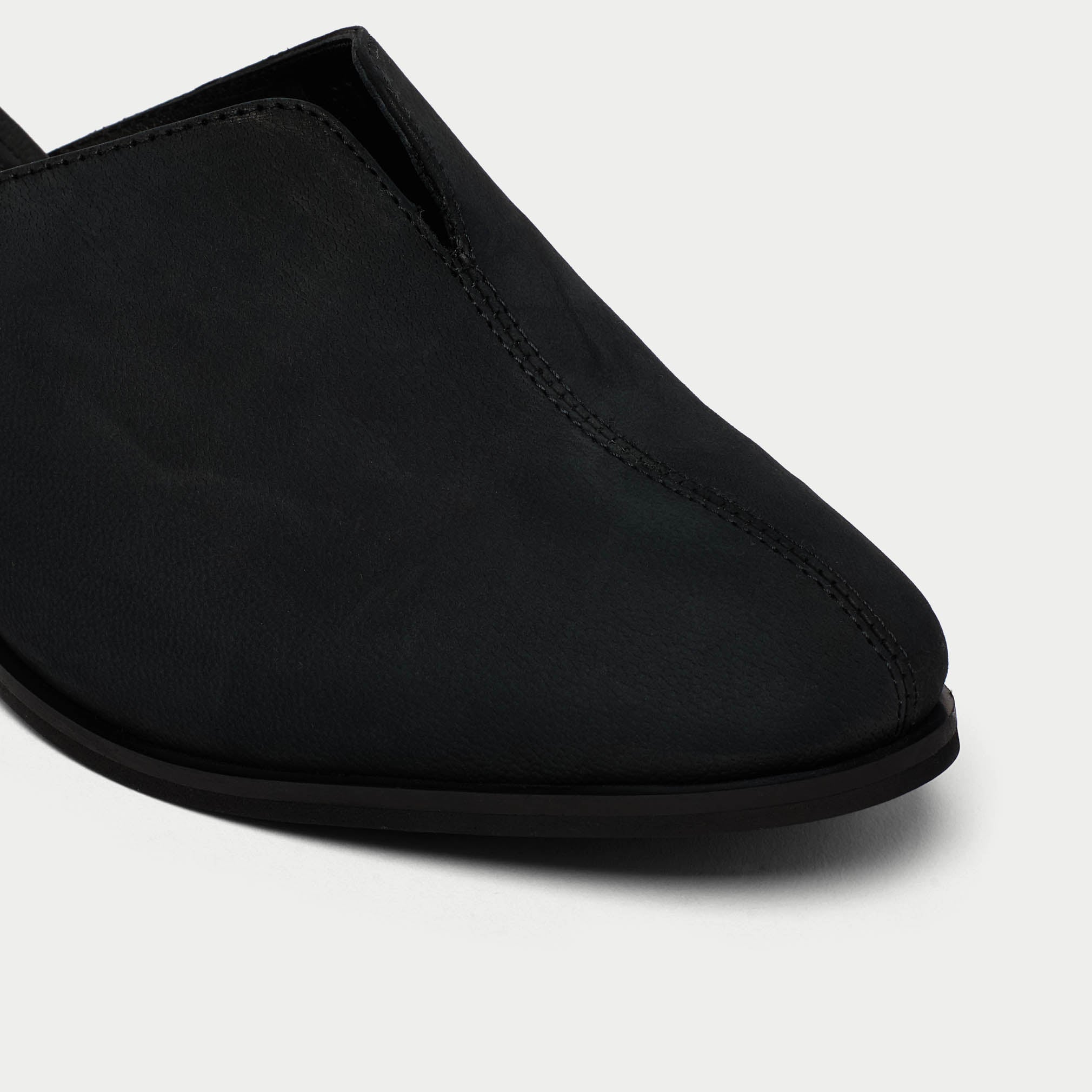 Eden black mules tip view