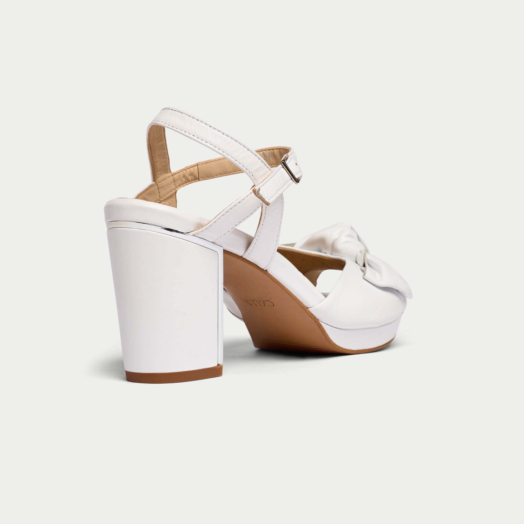 Lizzie white sandal heel close up