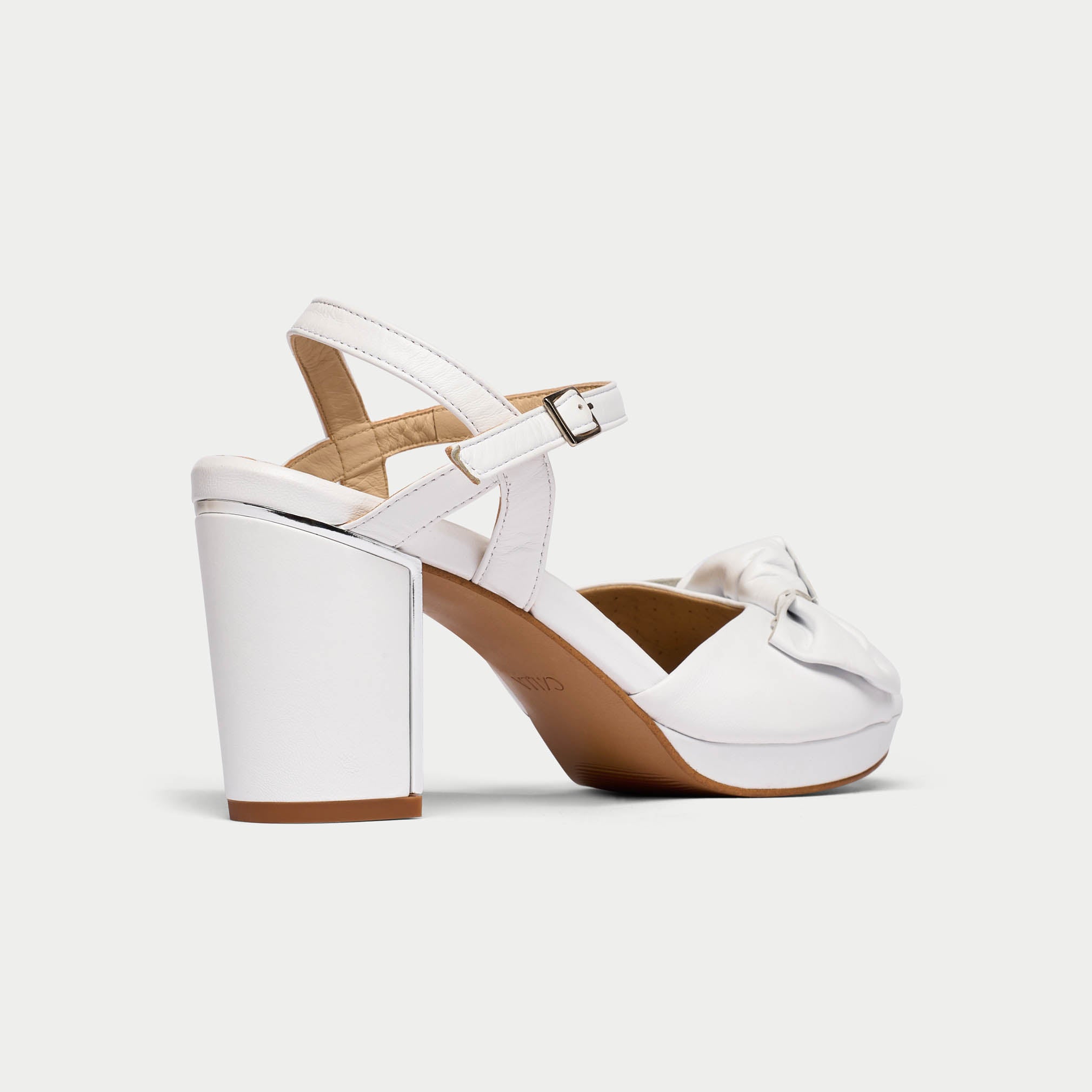 Lizzie white sandal heel back/side view
