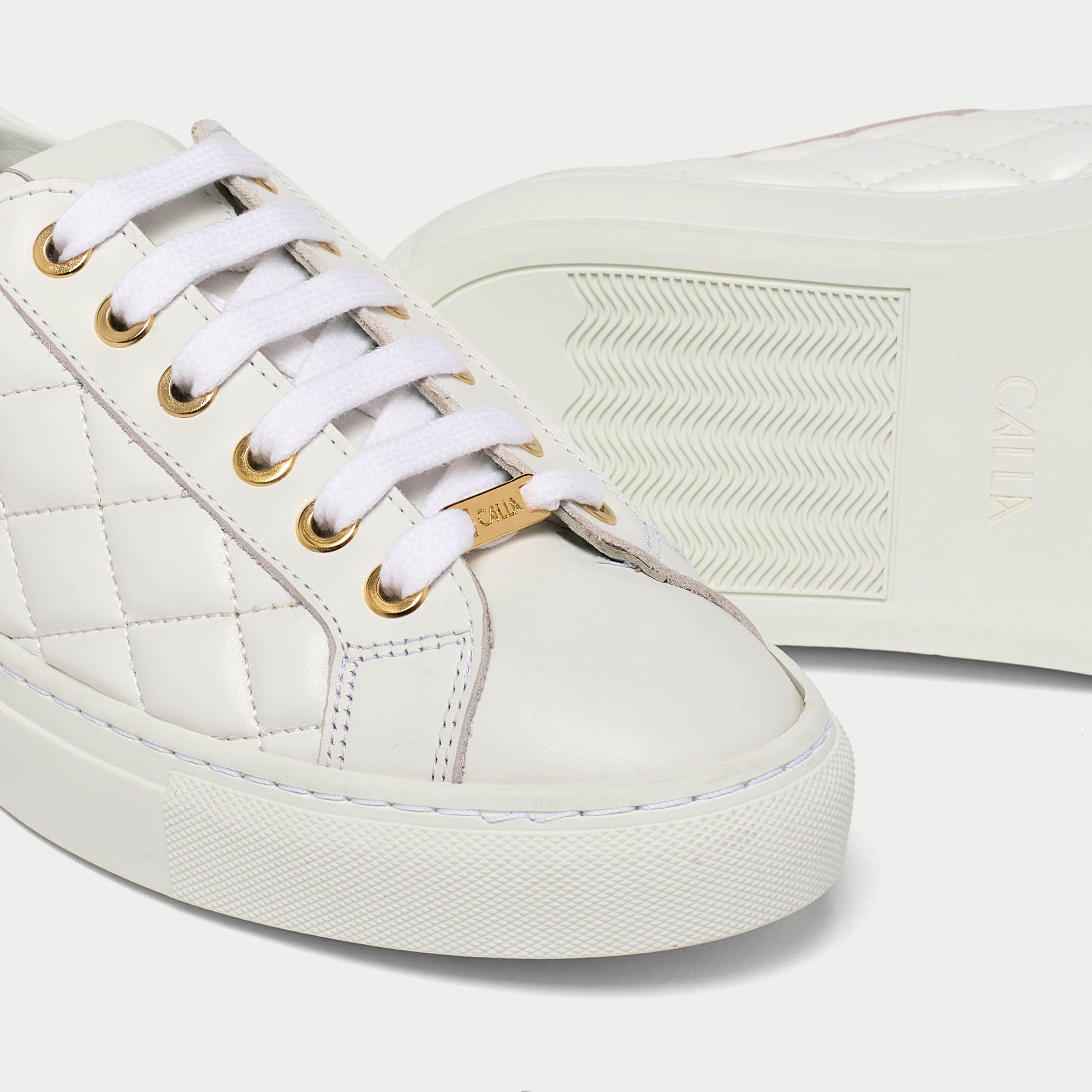 Star white quilted sneakers tip view