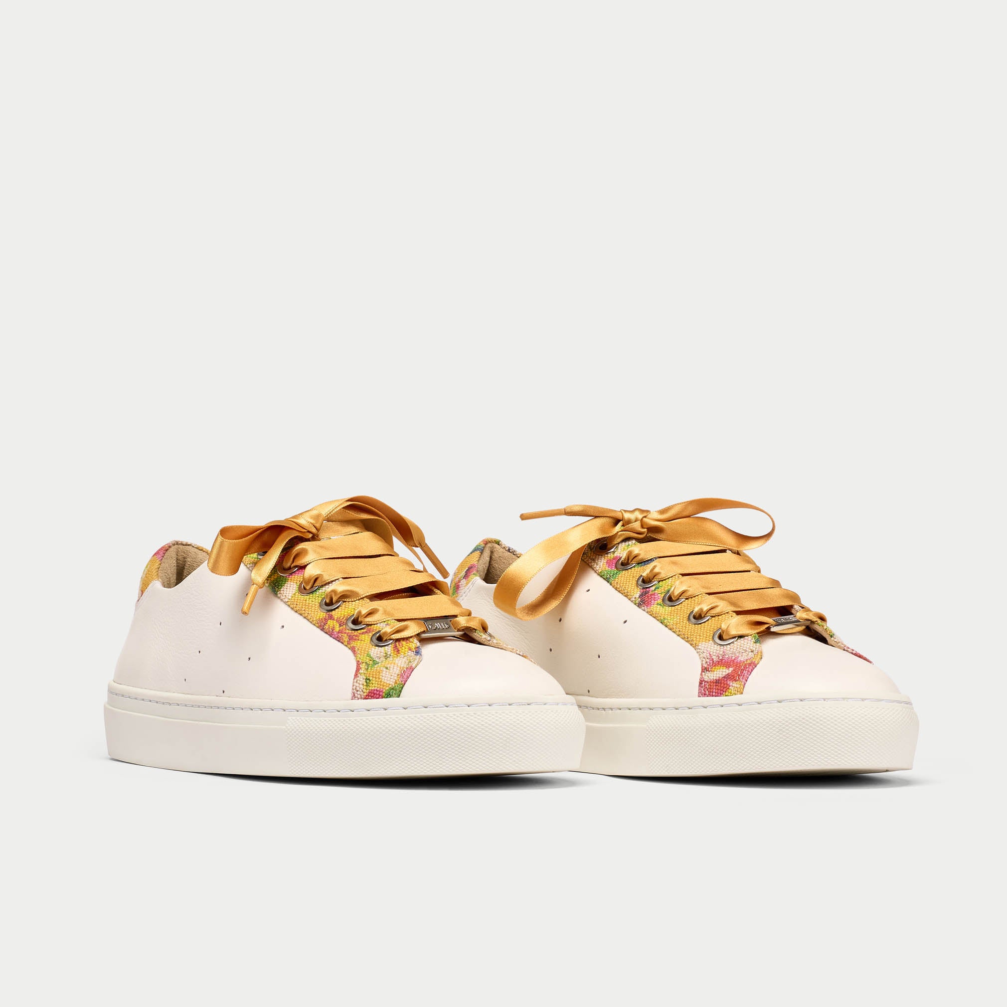 Star floral yellow trainer pair