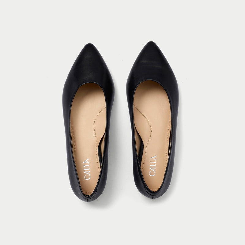 pair of black flats 