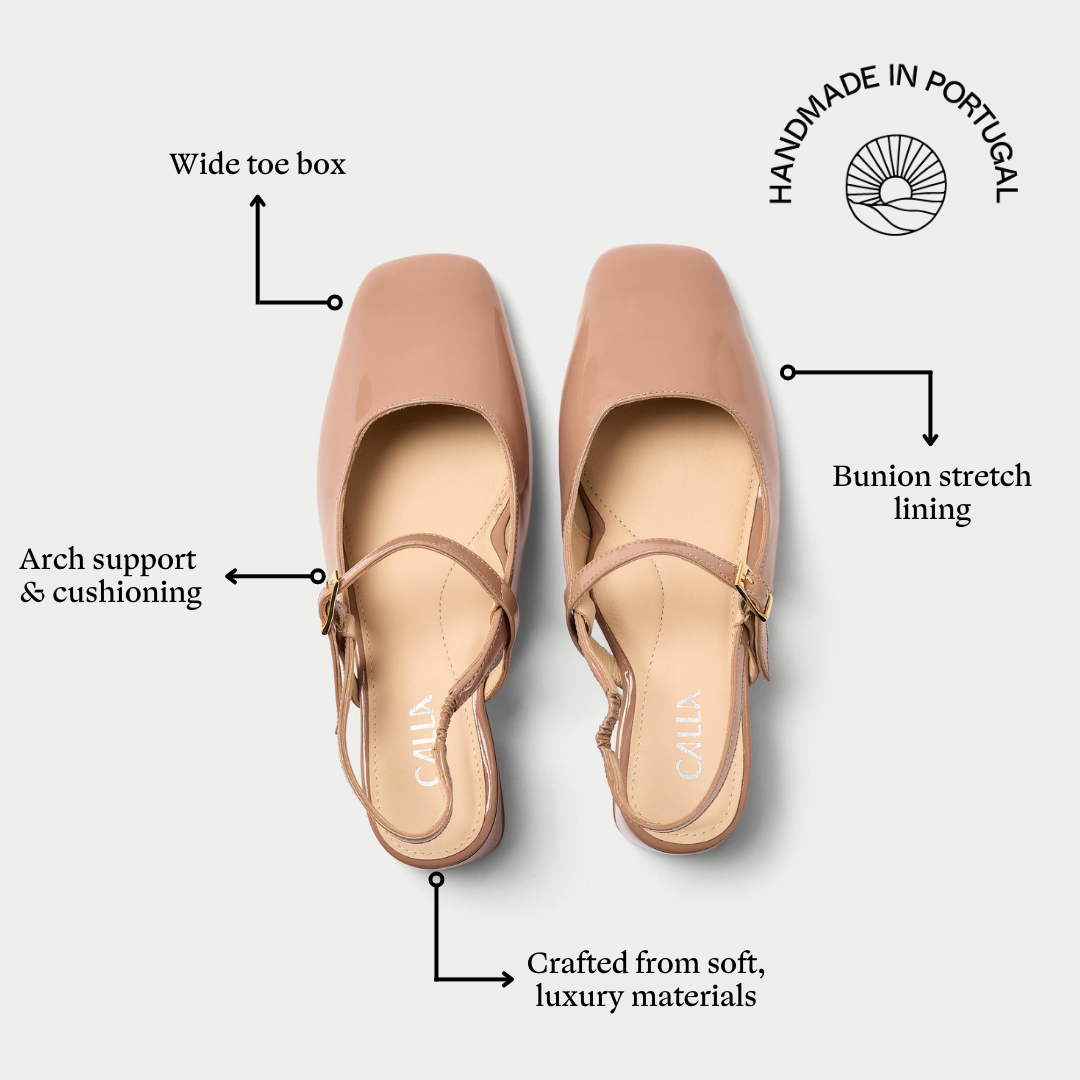 Pair of tan shoes with features highlighted on a white background