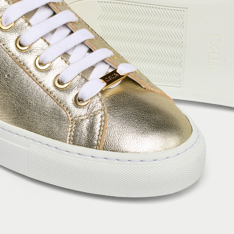 gold trainers for bunions close up 