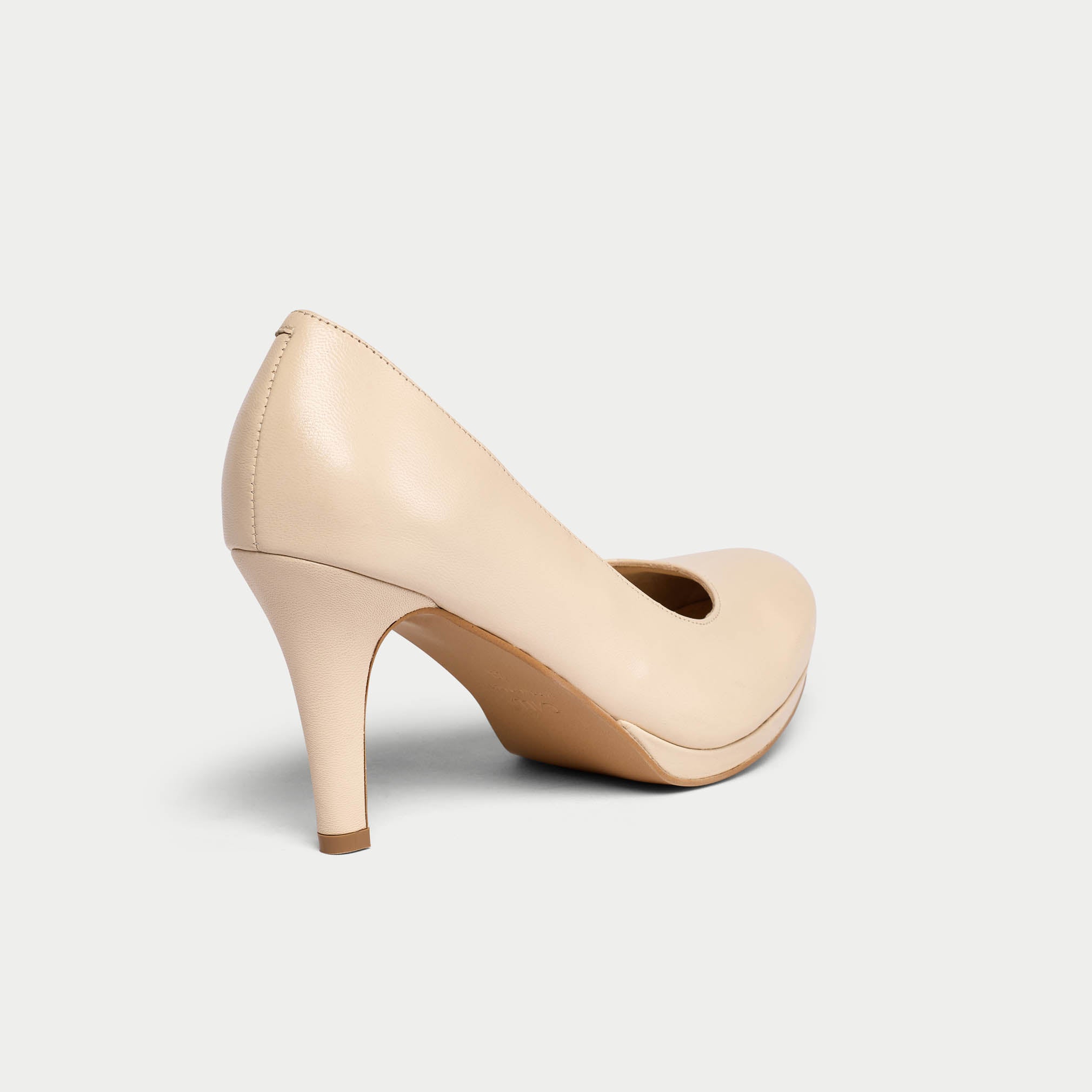 sophia beige heels on a white background heel view