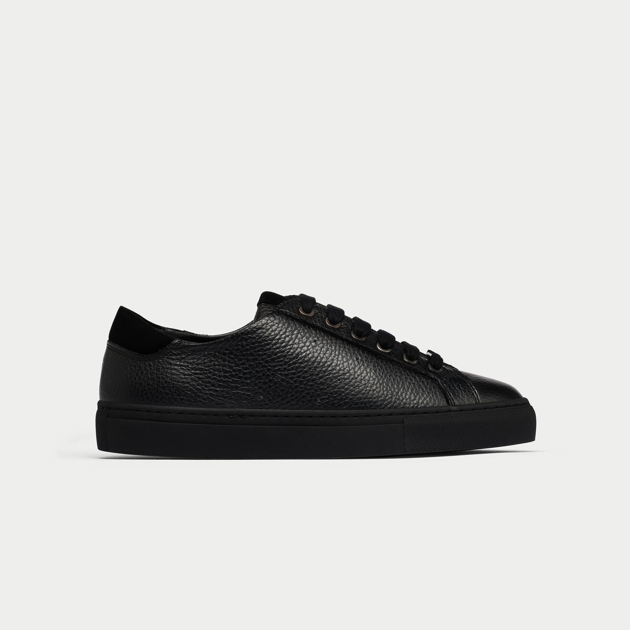 Star black leather sneaker side view