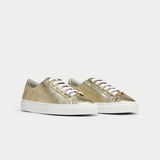 pair of gold trainers for bunions