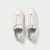 top view of a pair of calla grain champagne sneakers