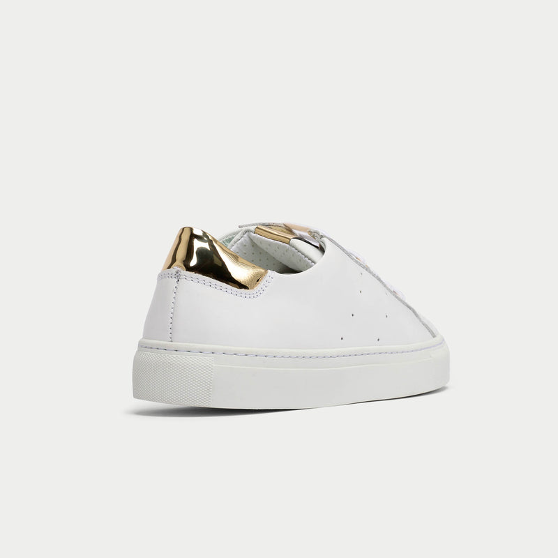 back view of white and gold metallic sneakers for bunions 